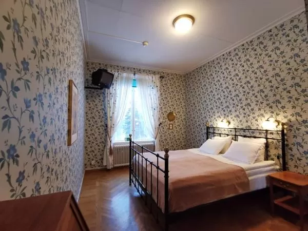 Bed in Ulfshyttans Herrgård, nära Romme Alpin