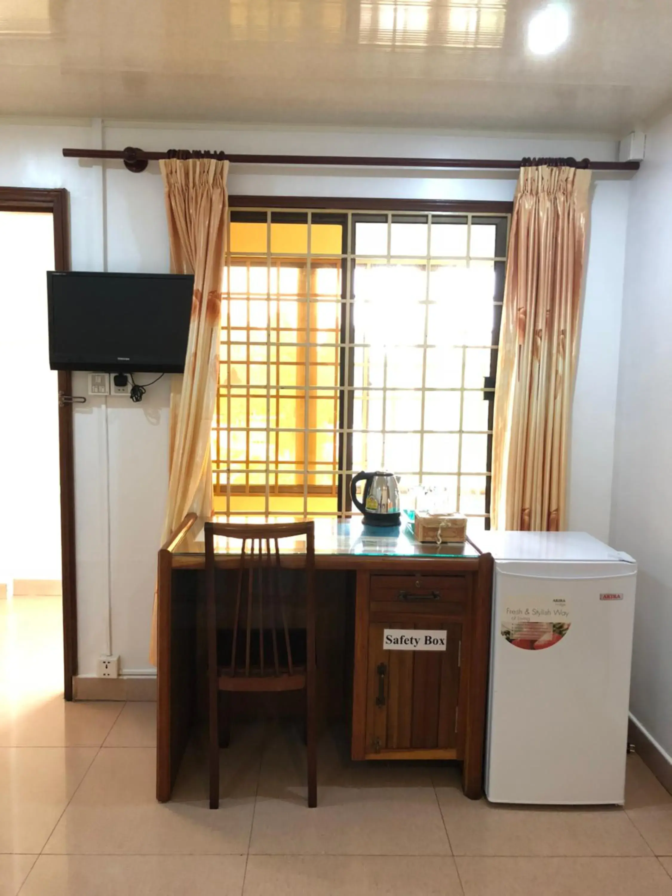 TV/Entertainment Center in The Bright Lotus Guesthouse