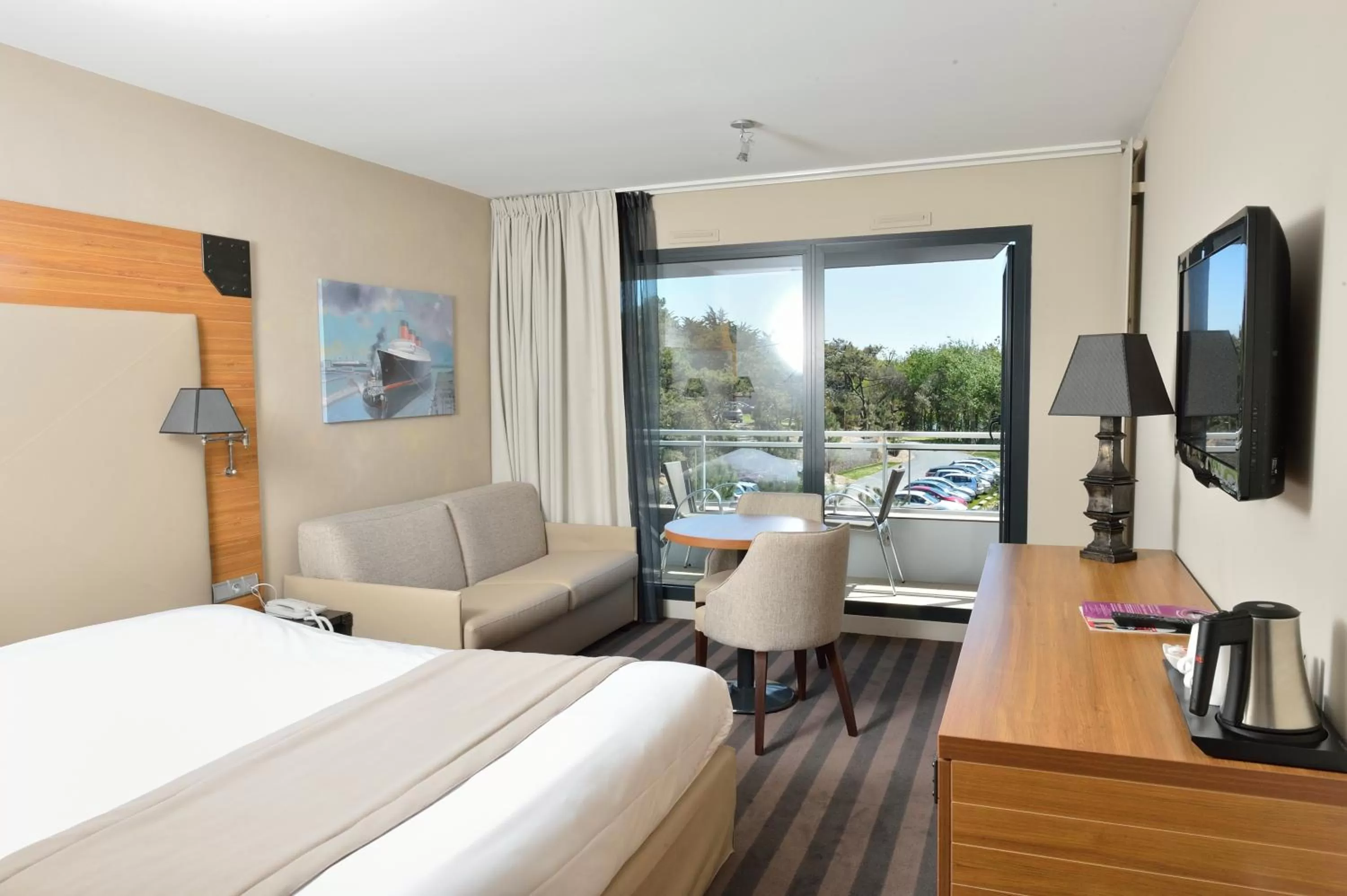 Photo of the whole room, Bed in Côte Ouest Thalasso & Spa Les Sables d'Olonne - MGallery Collection