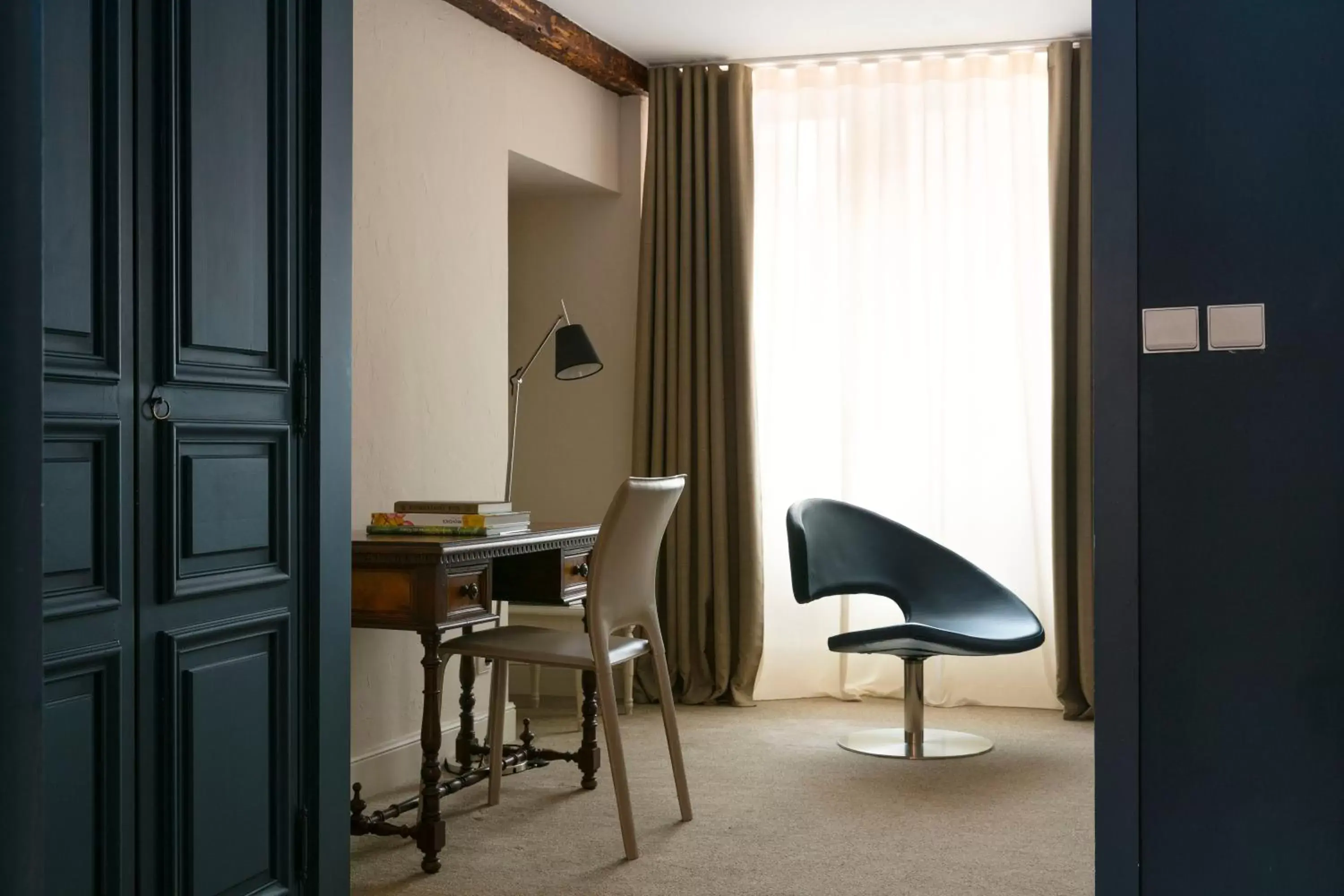 Seating area in Relais & Châteaux La Maison Des Têtes