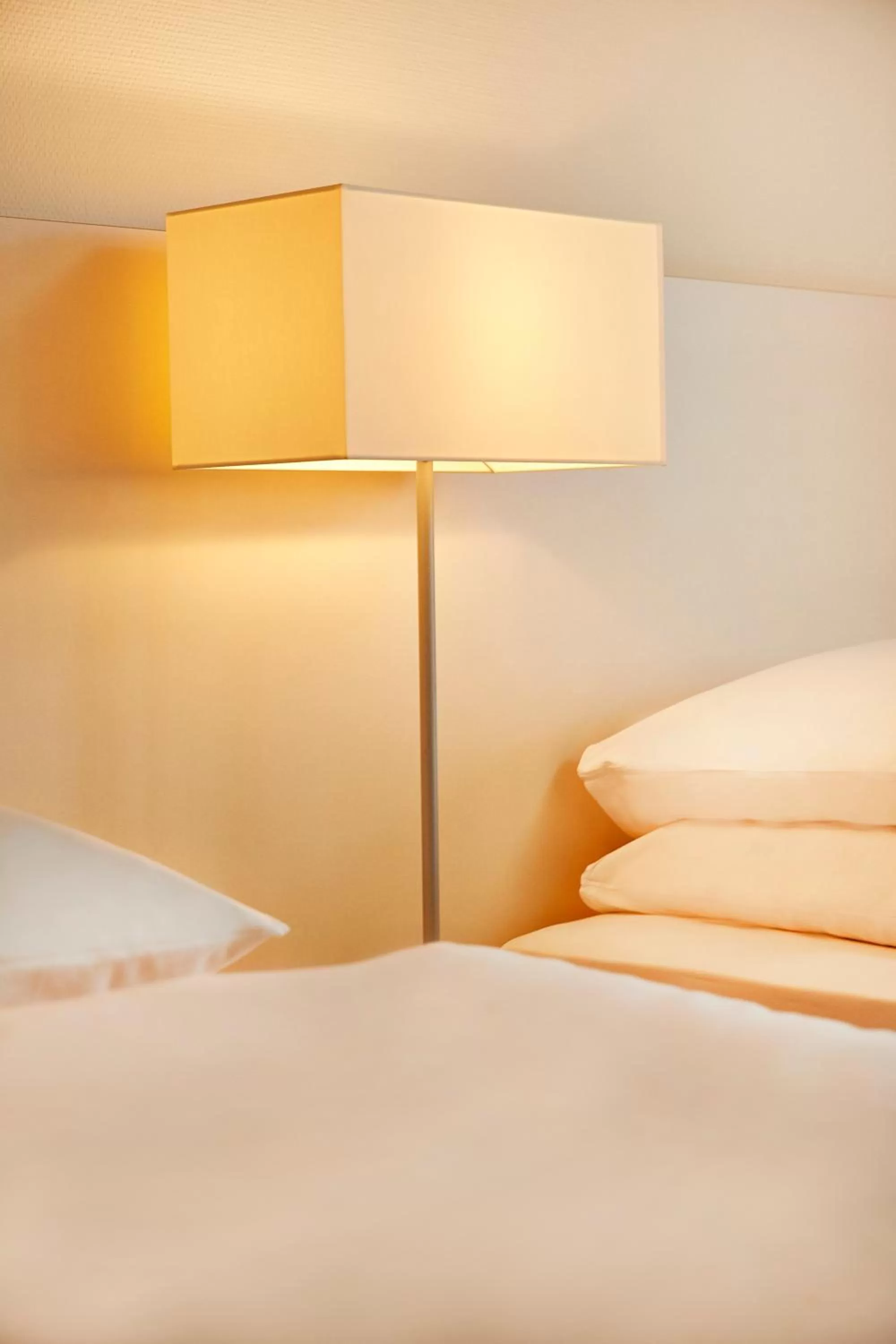 Bedroom, Bed in H+ Hotel Bad Soden