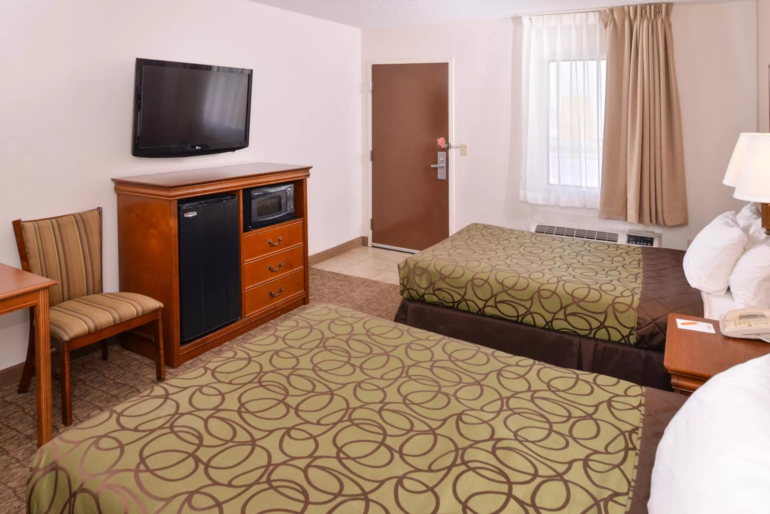 Bed in Briarwood Inn Of Geneva