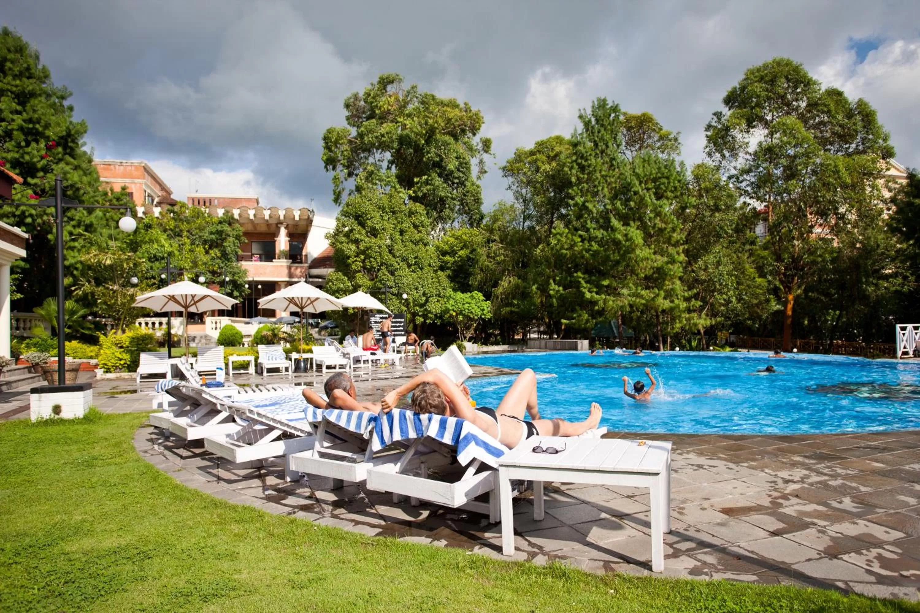 Swimming pool in Park Village Resort by KGH Group