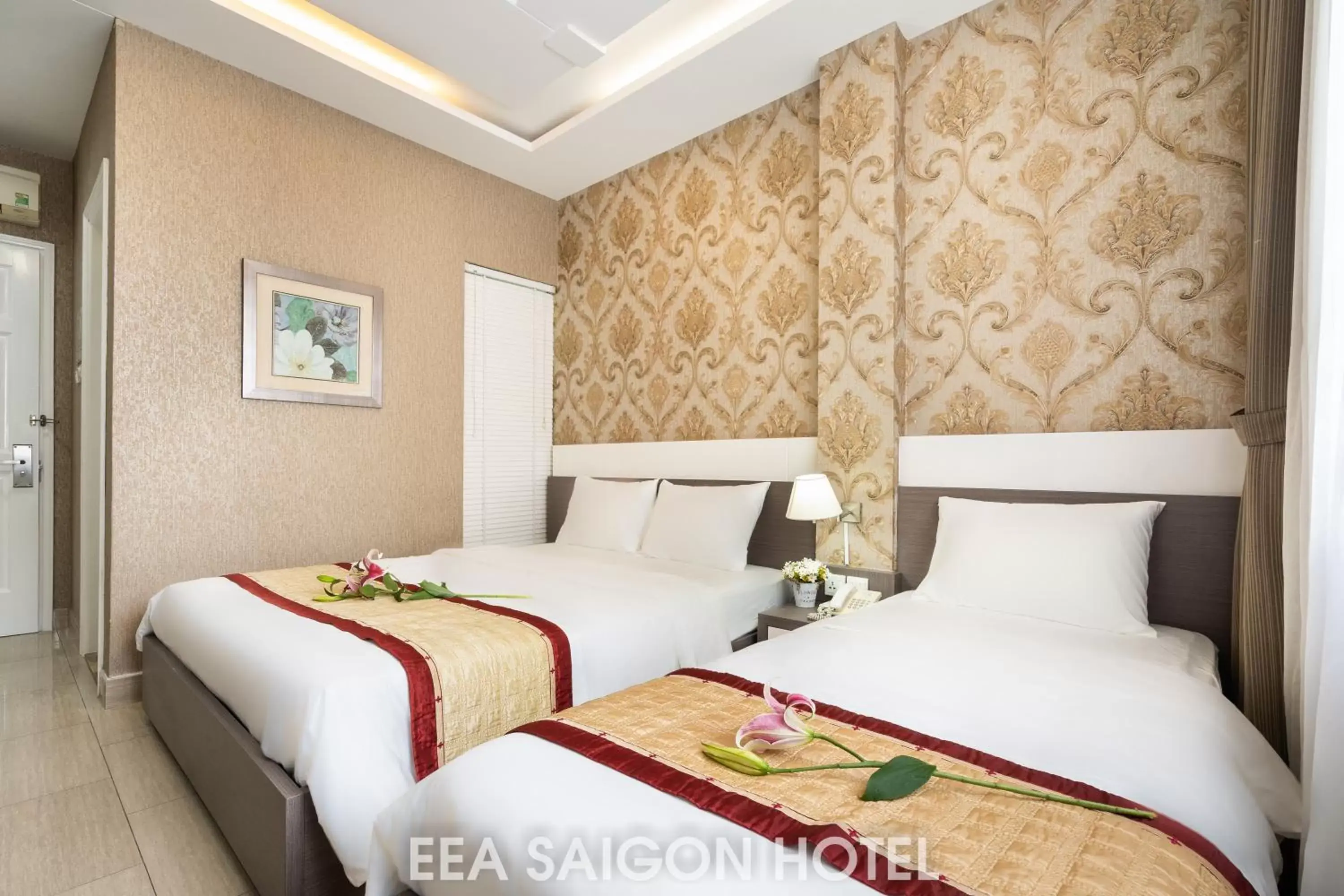 Bed in EEA Central Saigon Hotel