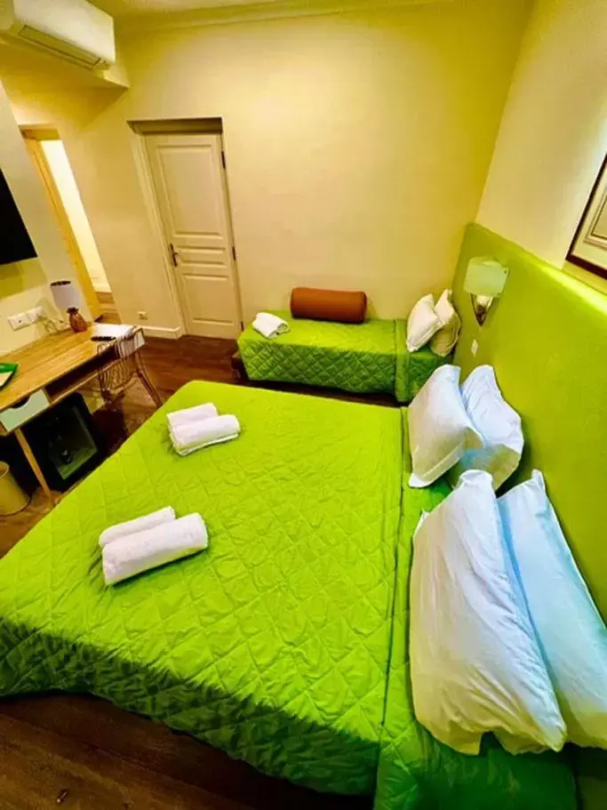 Bed in Quirinale luxury suite Roma