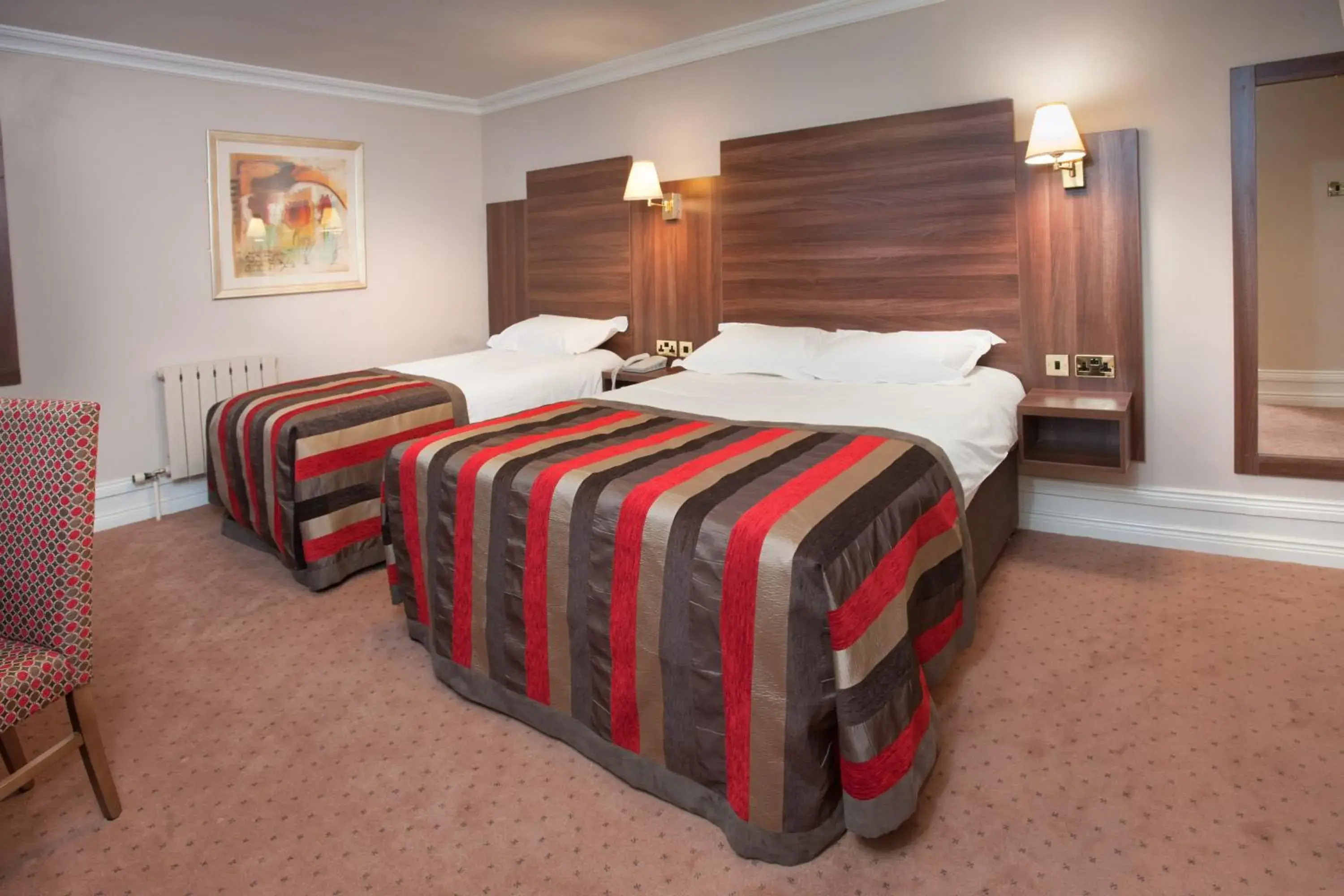 Bed in Adair Arms Hotel