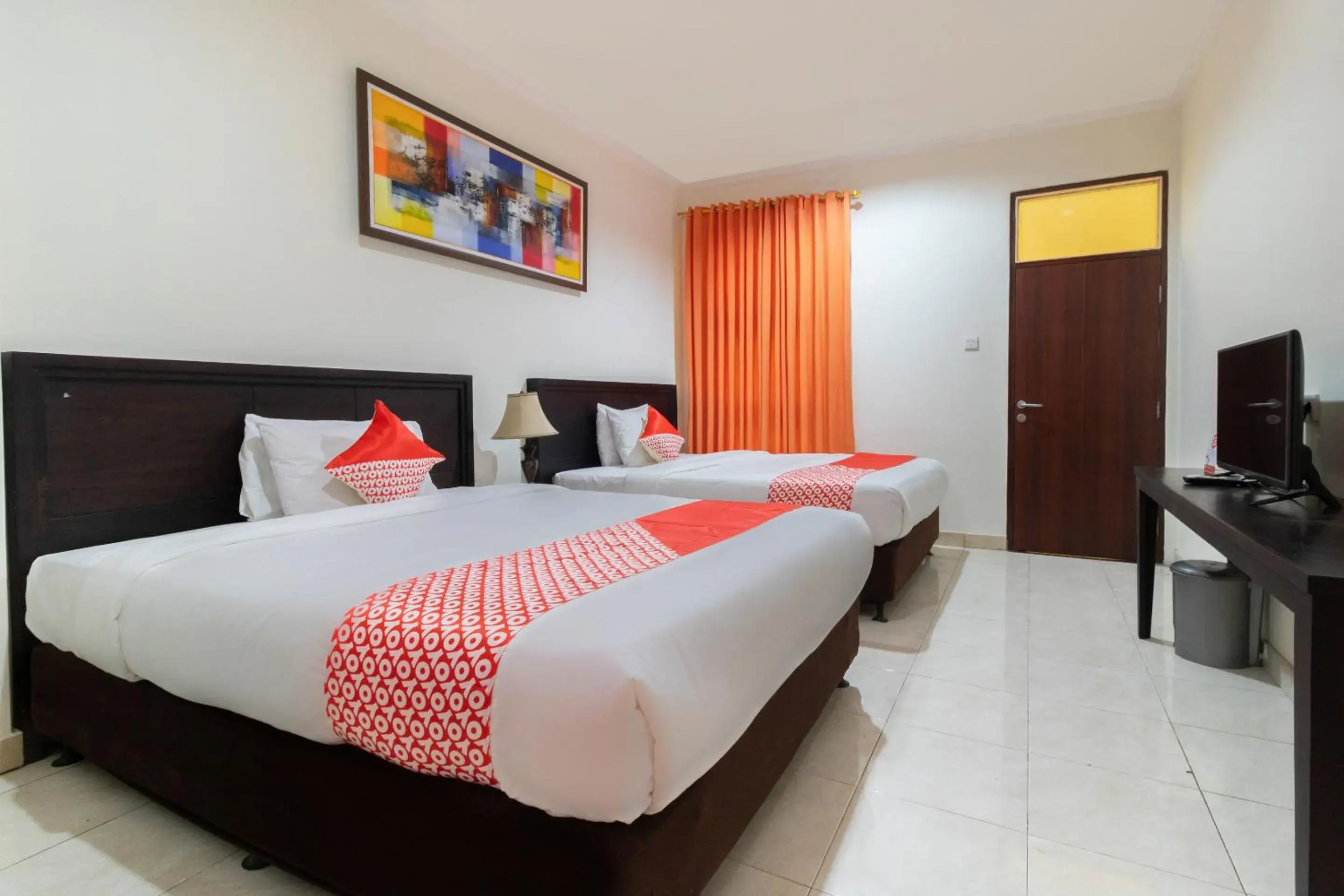 Bedroom, Bed in SUPER OYO Flagship 2688 Guntur Hotel