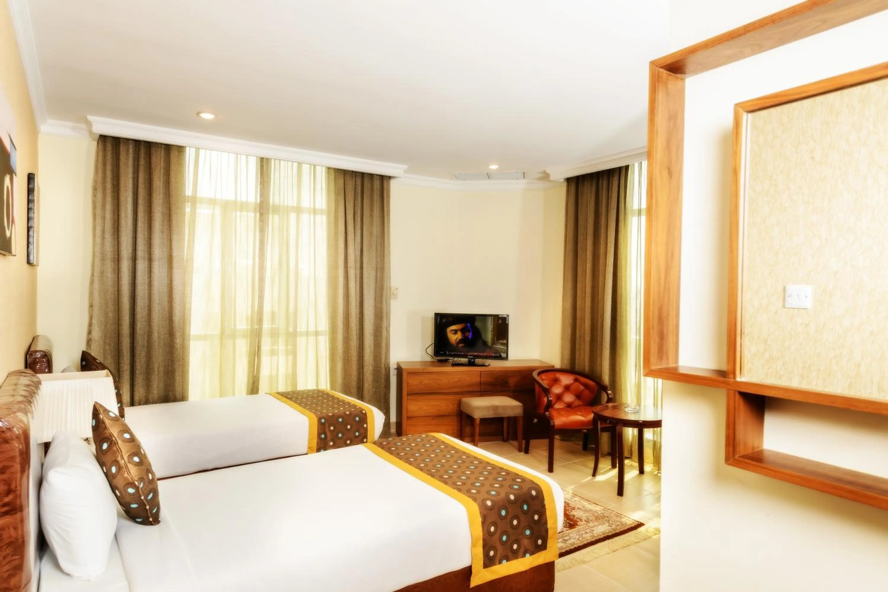 Bed in Bravo Royal Hotel Suites