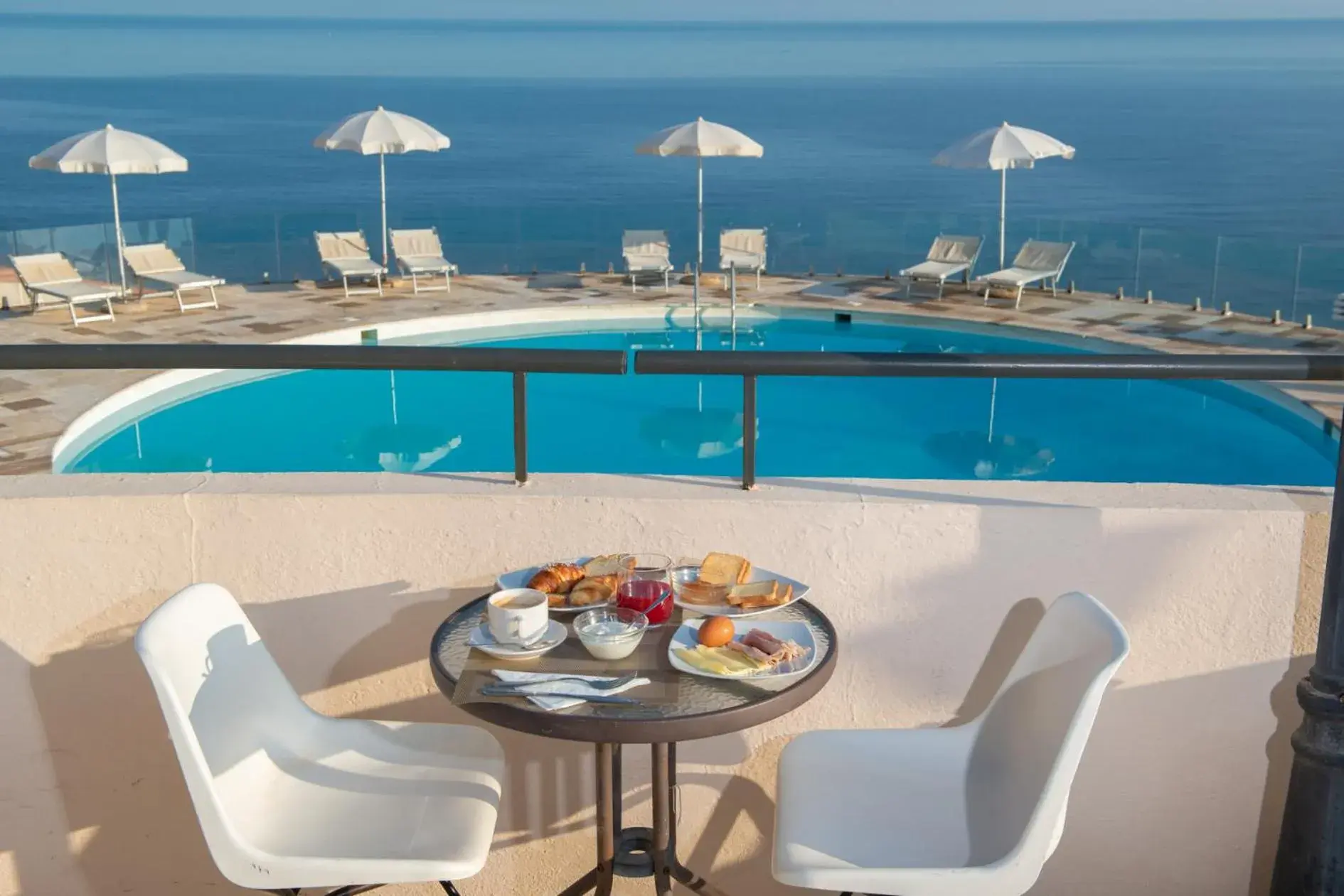 Balcony/Terrace, Swimming Pool in Castelsardo Resort Village