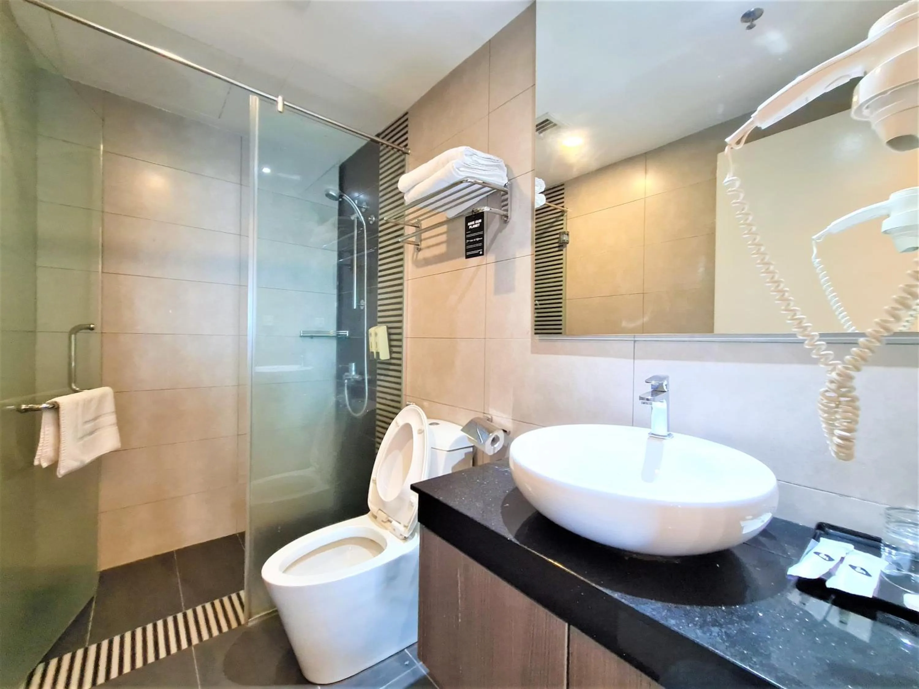 Shower in Nexus Regency Suites & Hotel