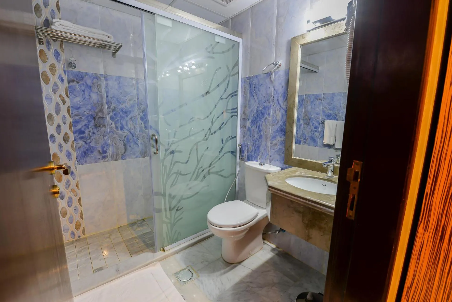 Shower in Crown Town Hotel