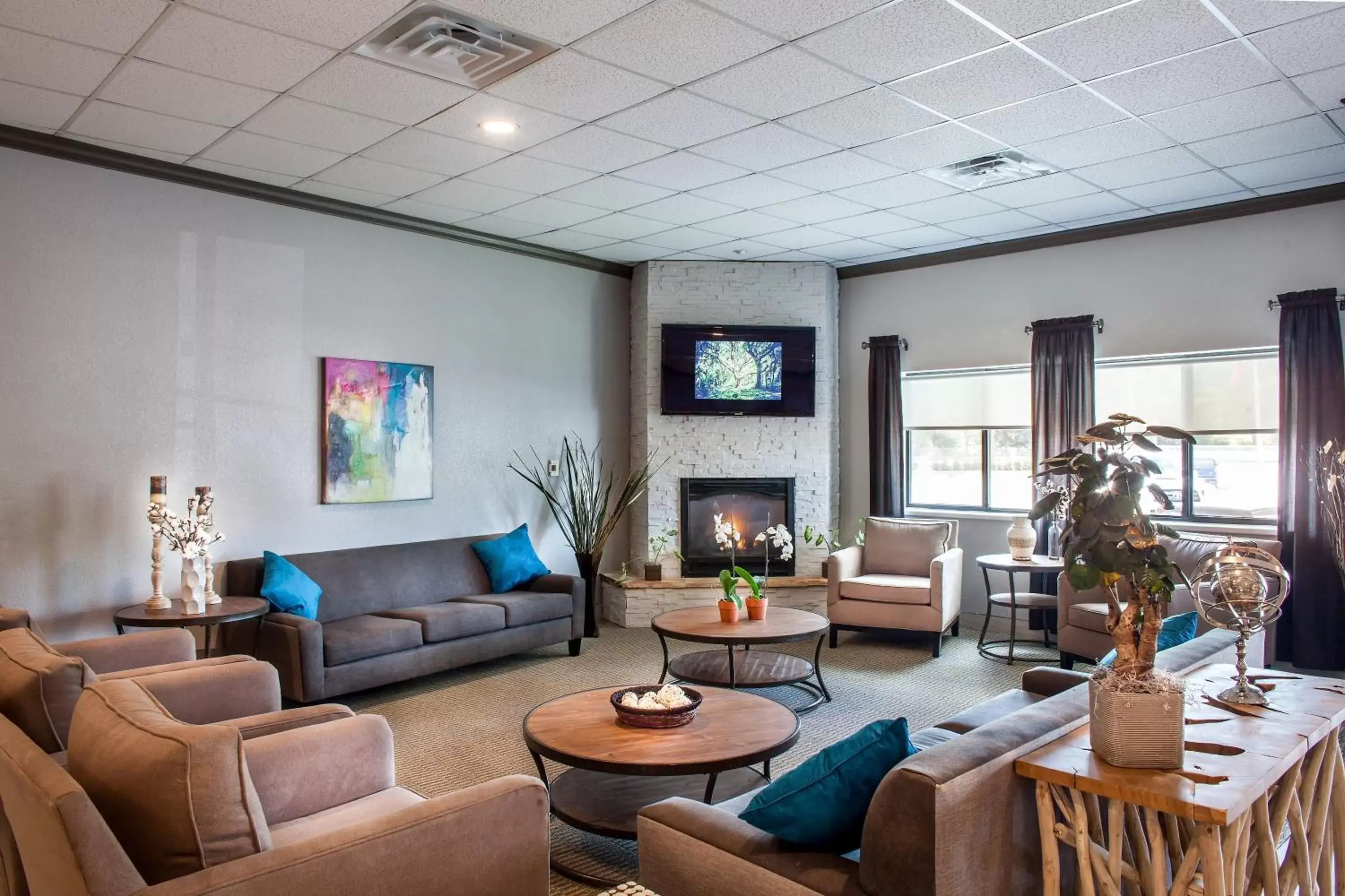 Lobby or reception, Seating Area in Heartland Inn Coralville