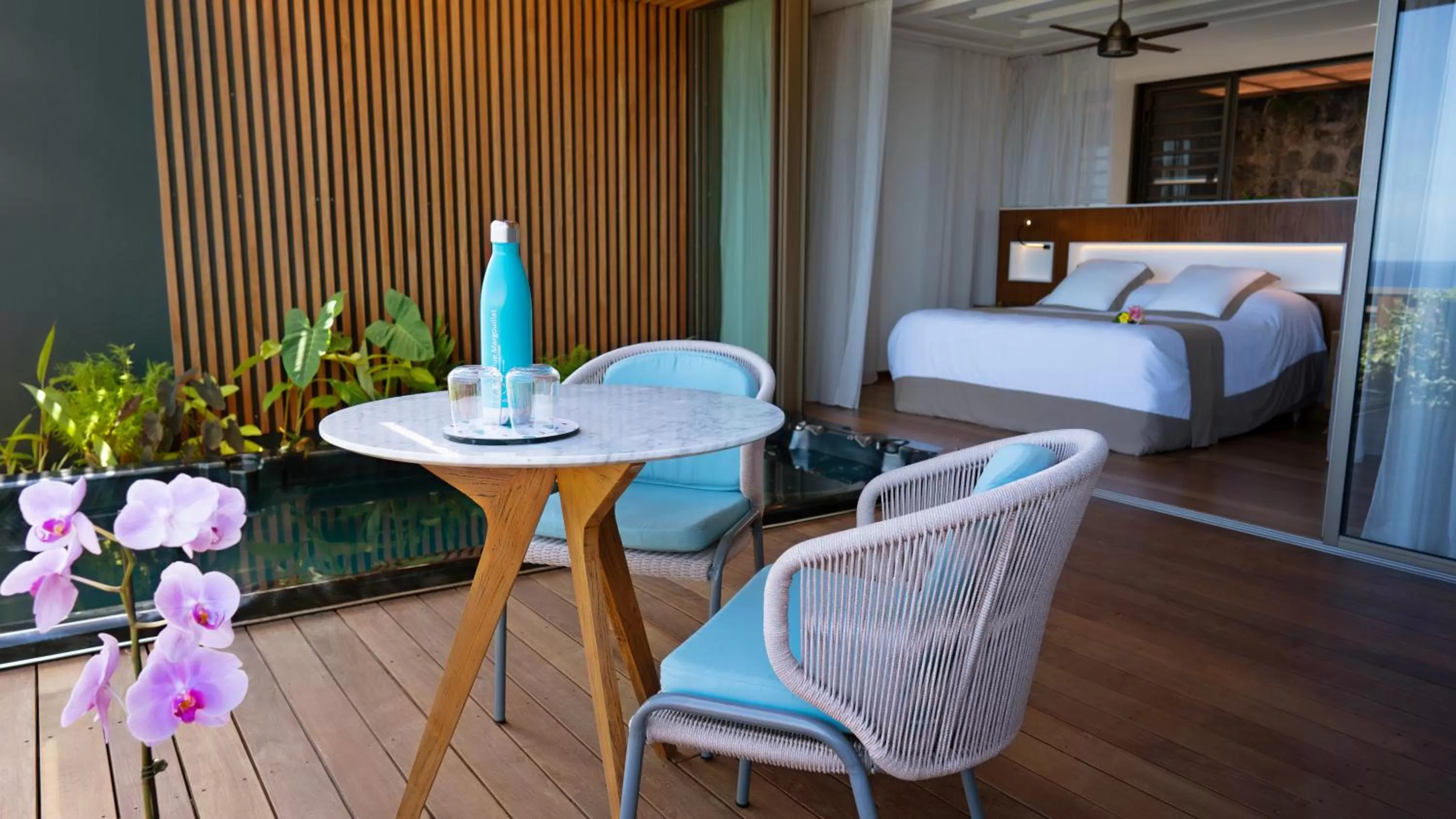 Bed in Blue Margouillat Seaview Hotel-RELAIS & CHATEAUX