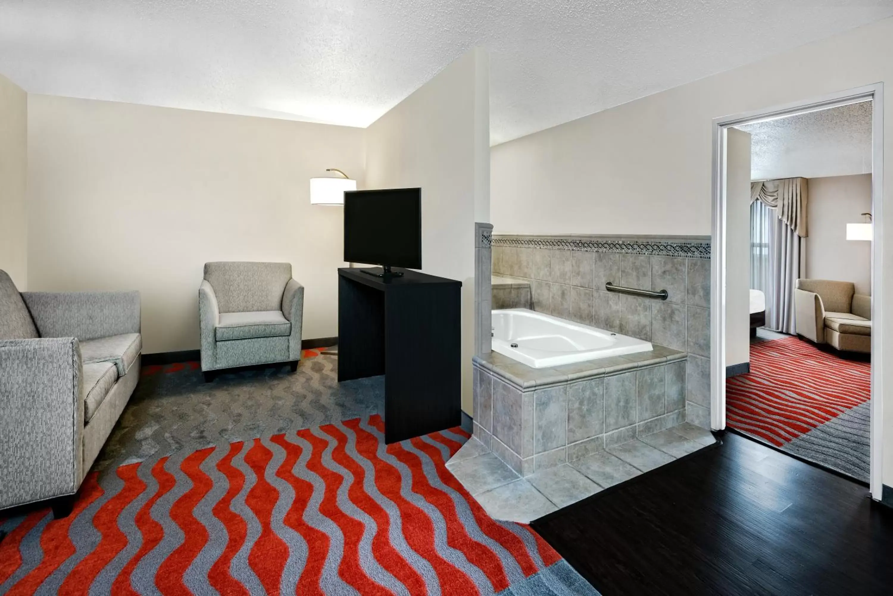TV/Entertainment Center in Holiday Inn & Suites College Station-Aggieland, an IHG Hotel