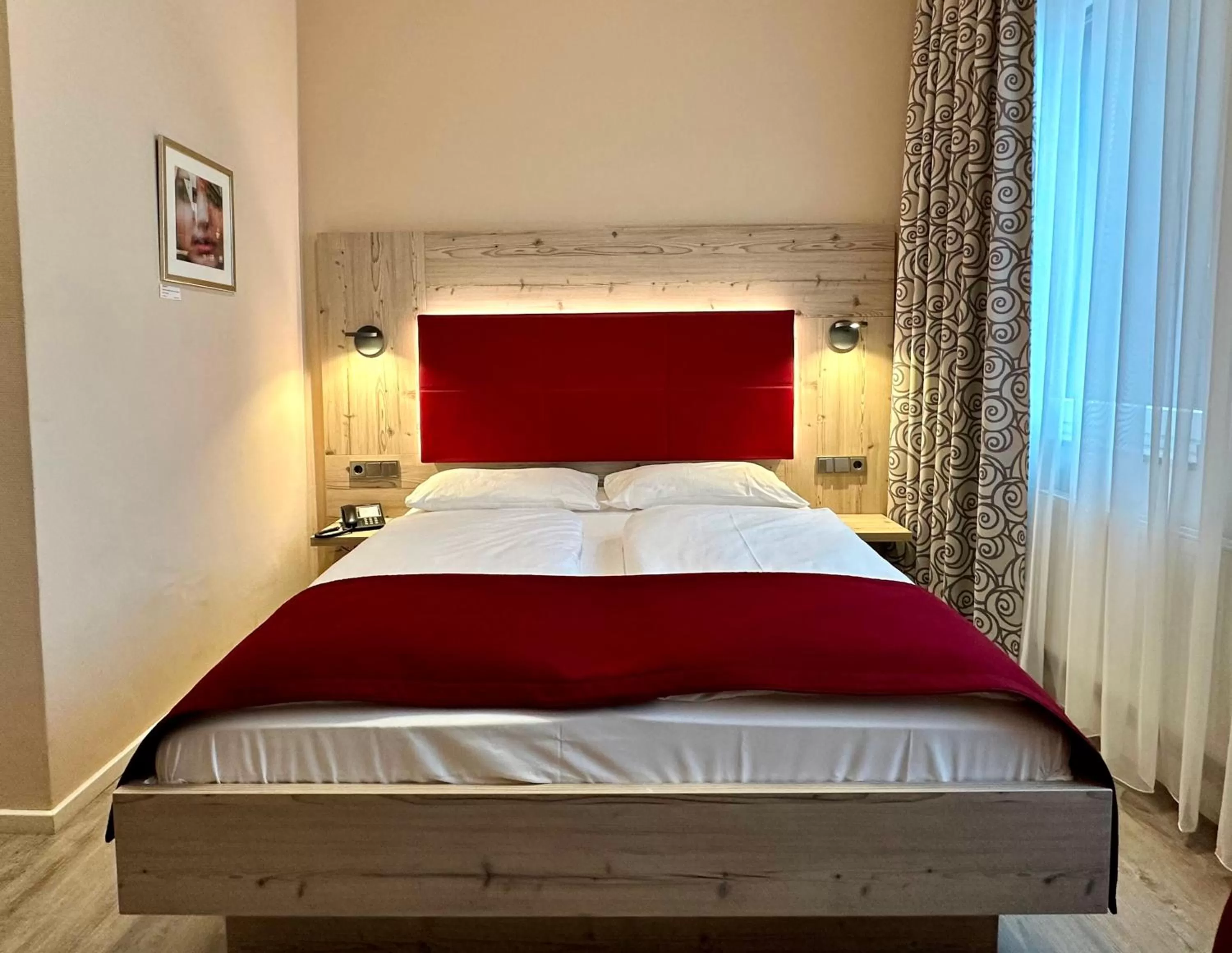 Bed in TRIP INN PostHotel Düren