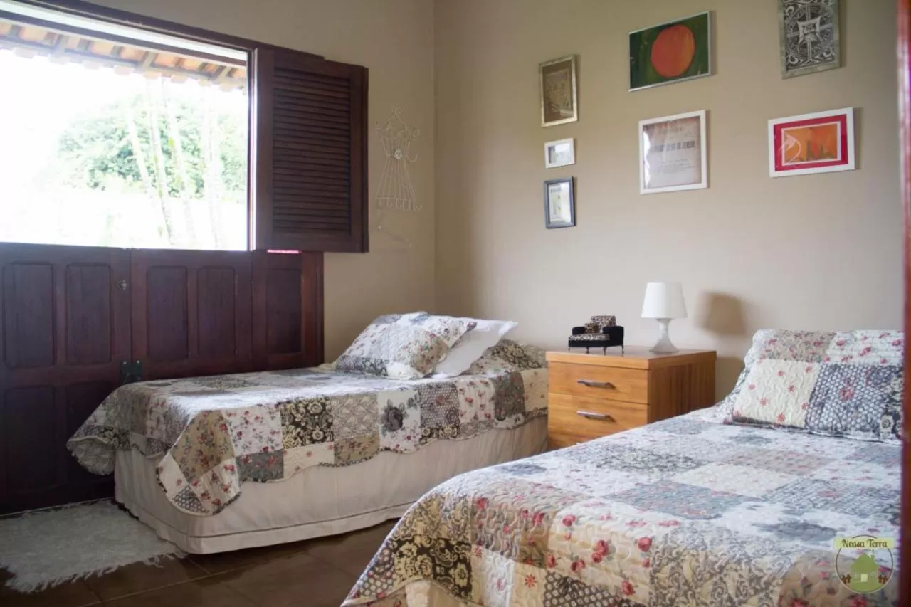 Bed in Pousada Nossa Terra