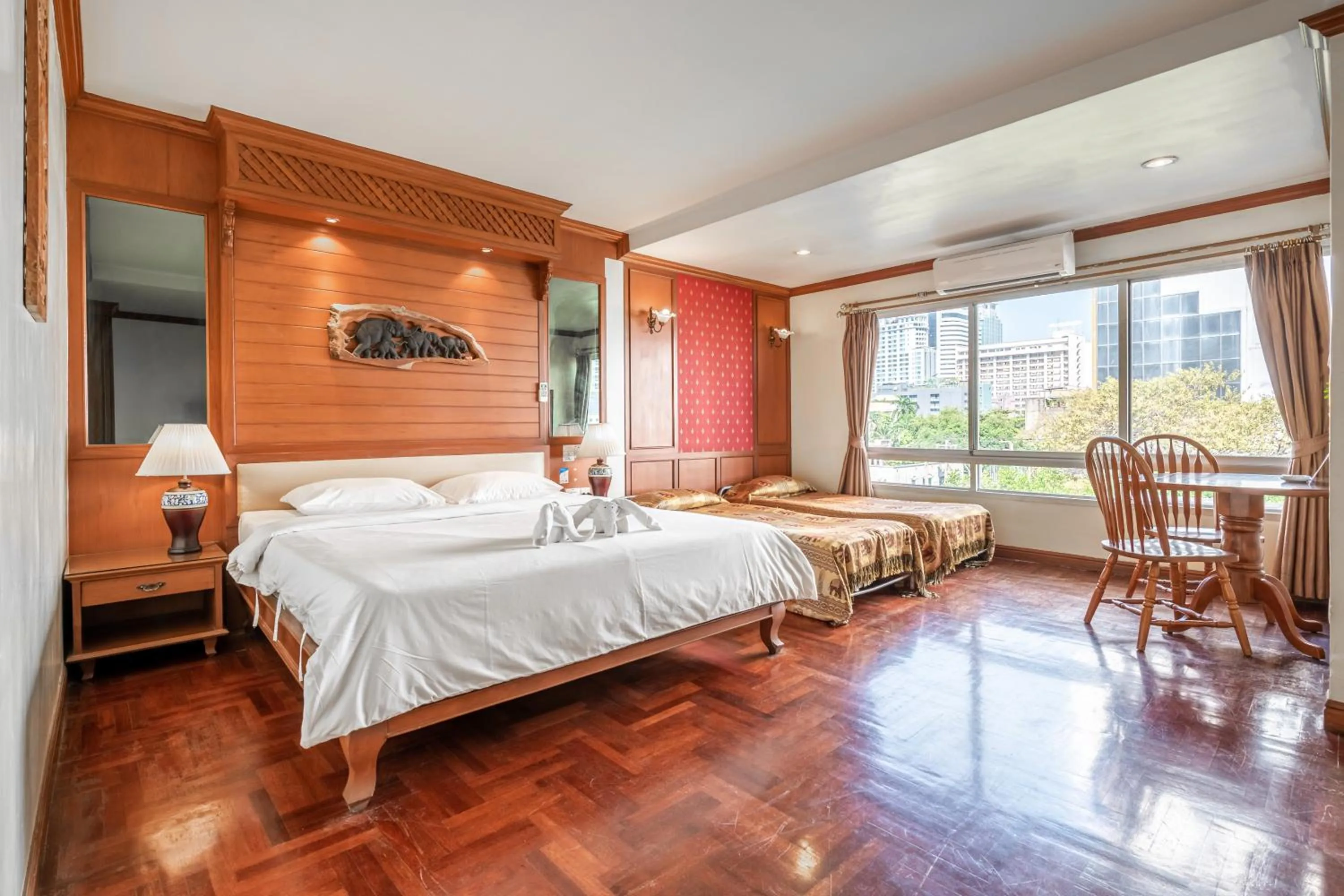 Photo of the whole room, Bed in Royal Ivory Sukhumvit Nana