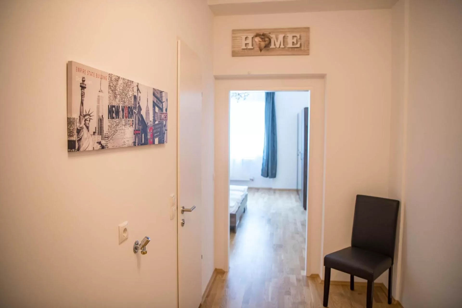 TV/Entertainment Center in Minihotel Graz Apartments