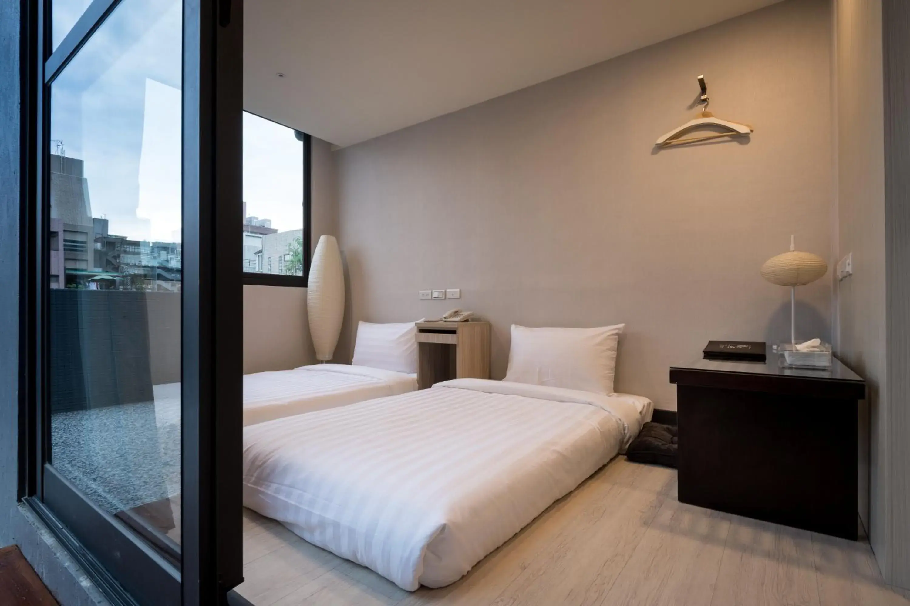 Bed in Urhome Hotel