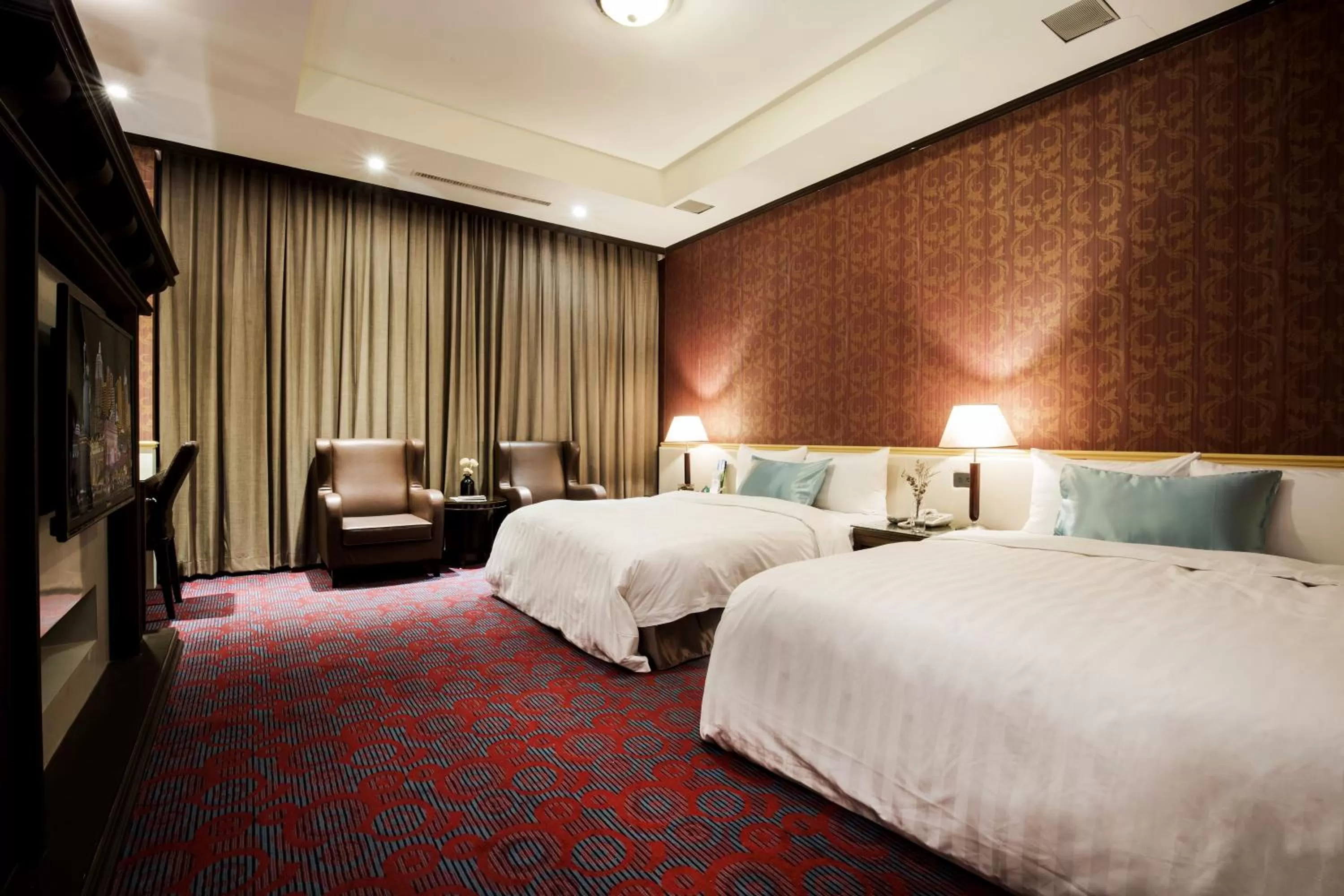 Bed in Duo Romance Hotel