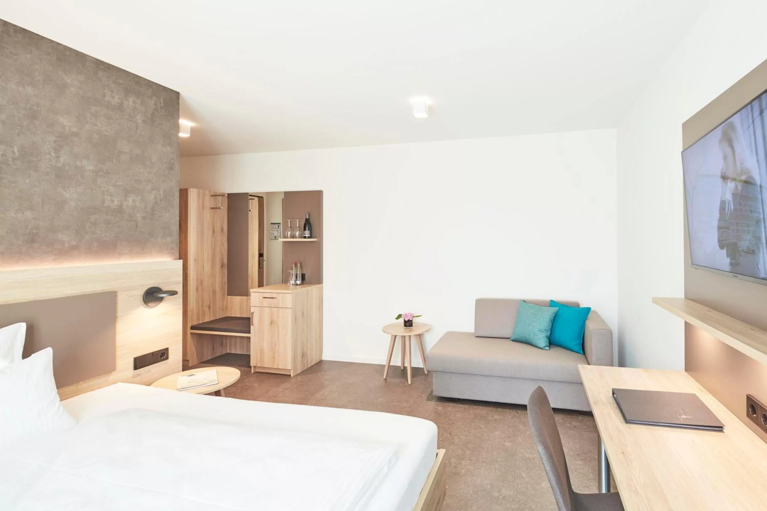 Bed in Gästehaus Bauer - Schlafen auf dem Weingut