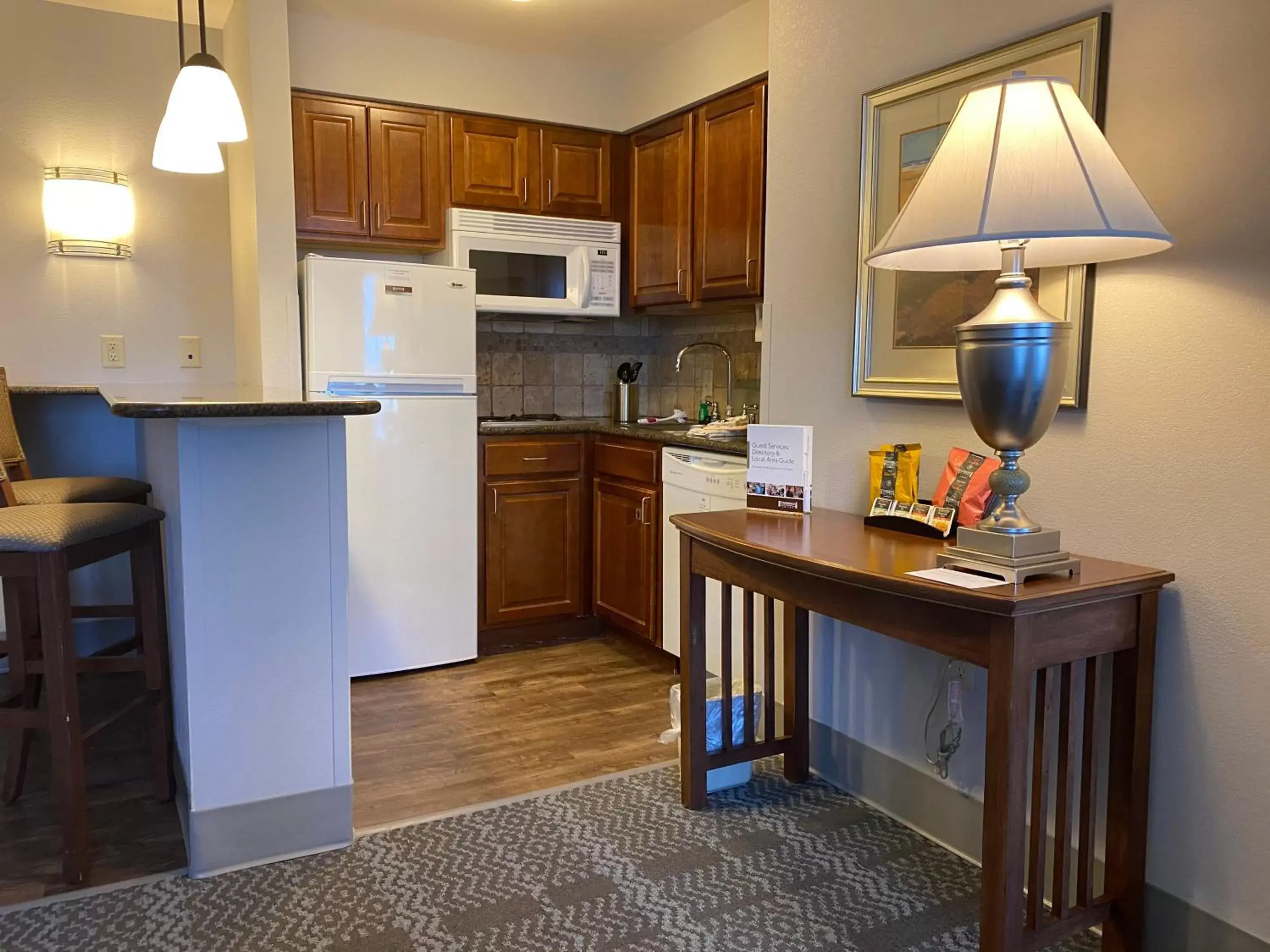 Photo of the whole room, Kitchen/Kitchenette in Staybridge Suites Milwaukee West-Oconomowoc, an IHG Hotel