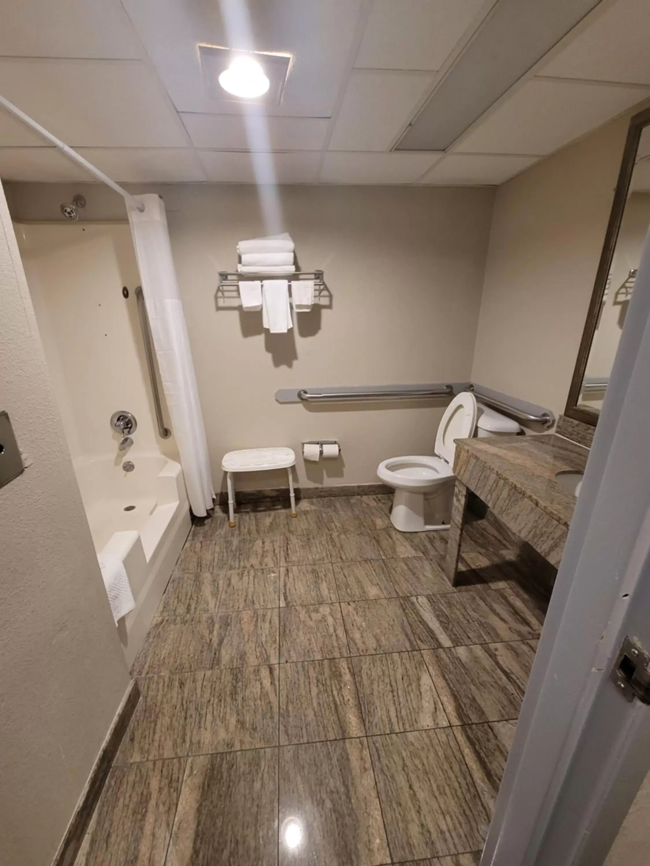 Bathroom in SureStay Plus Hotel by Best Western McGuire AFB Jackson