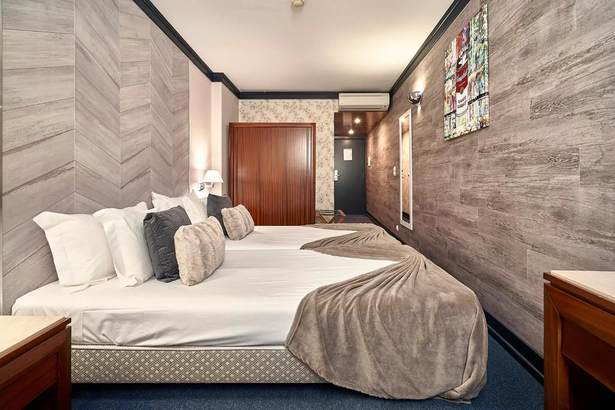 Bed in Galeria Suite Hotel