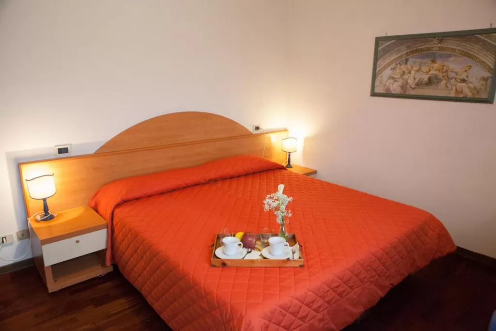 Bed in Giada Palace - Rooms