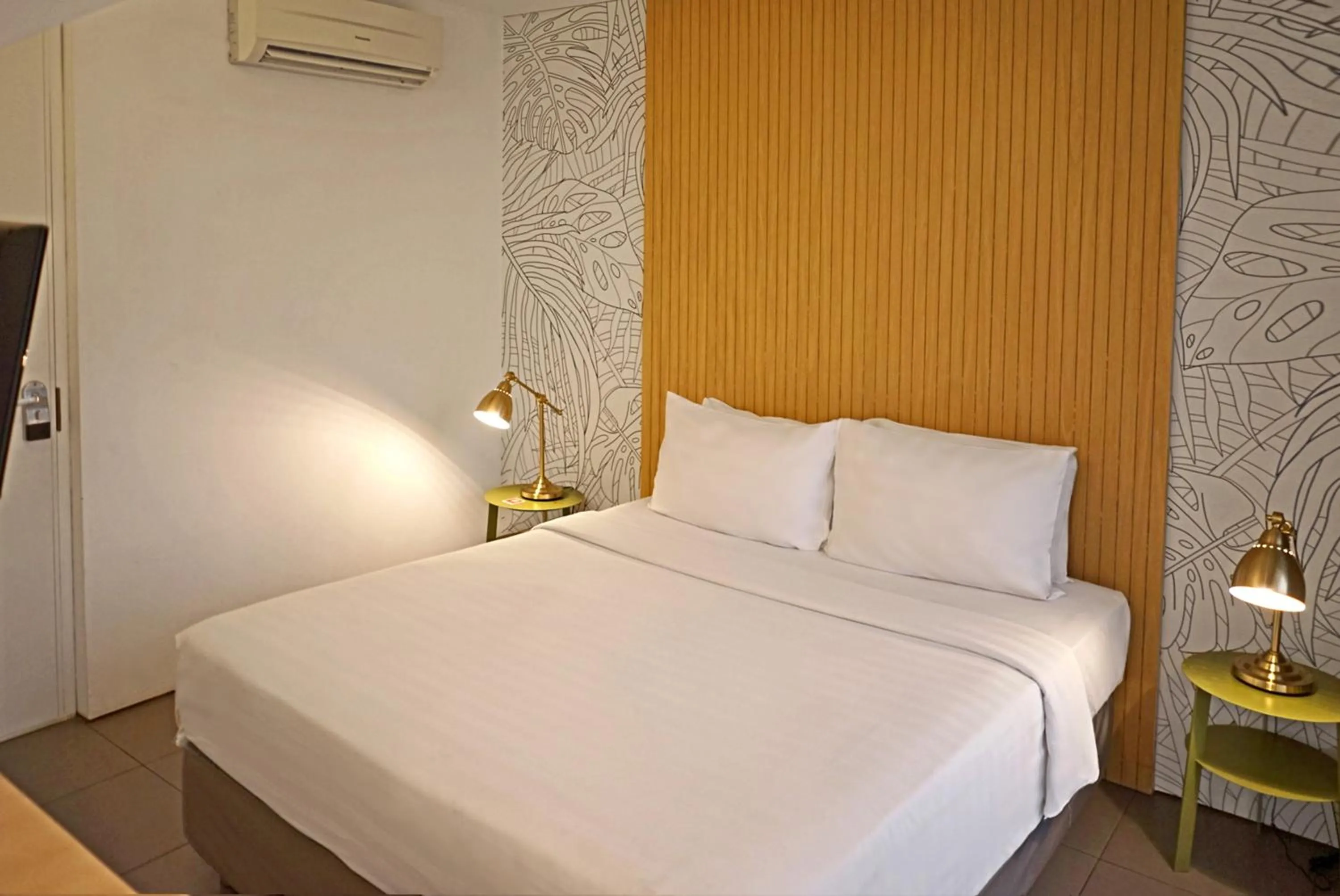 Bed in Malaka Hotel Bandung