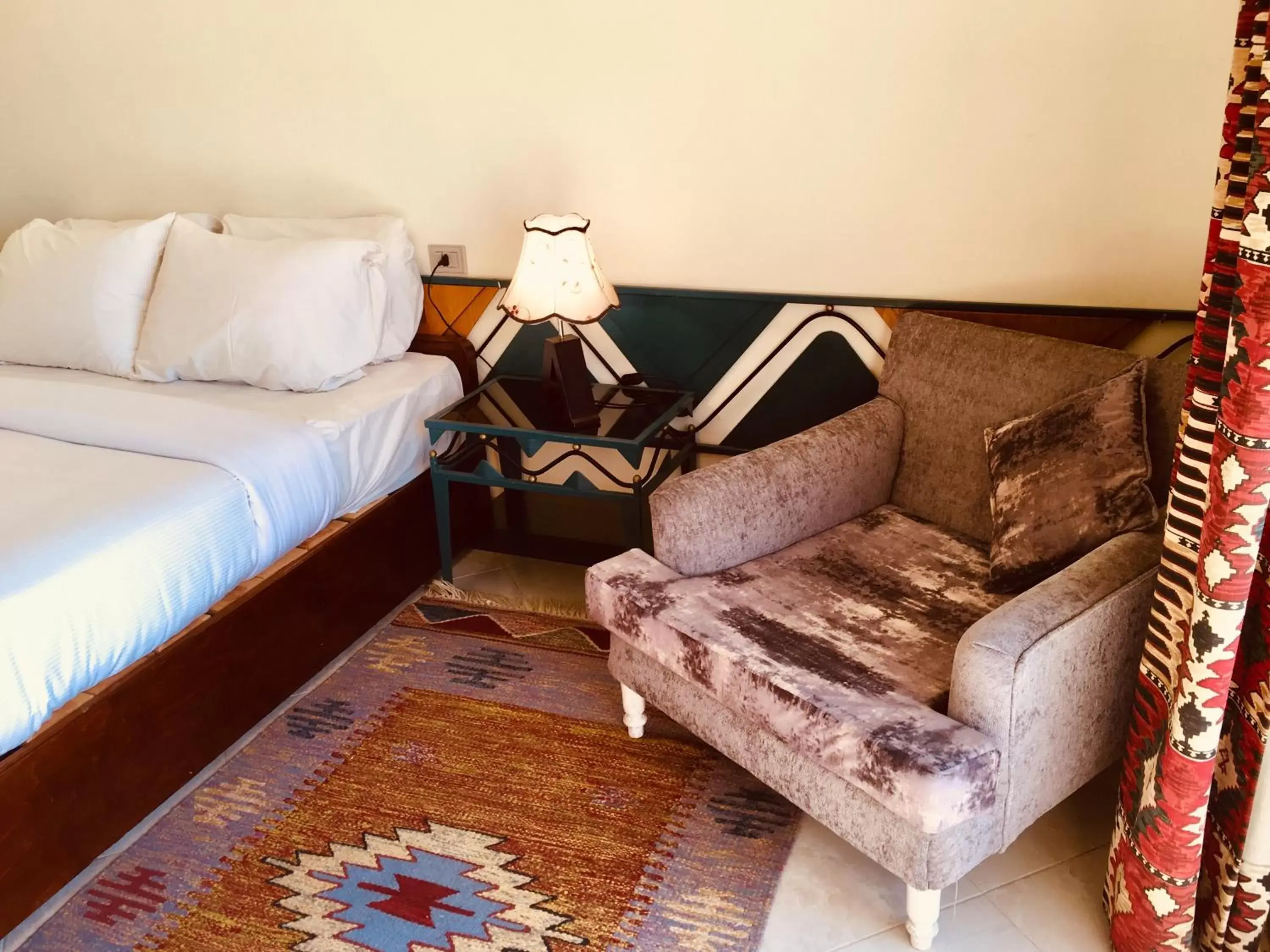 Bed in New Memnon Hotel