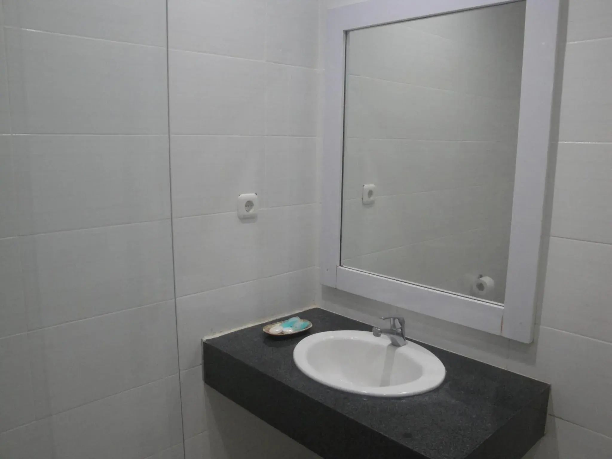 Bathroom in Matahari Hotel