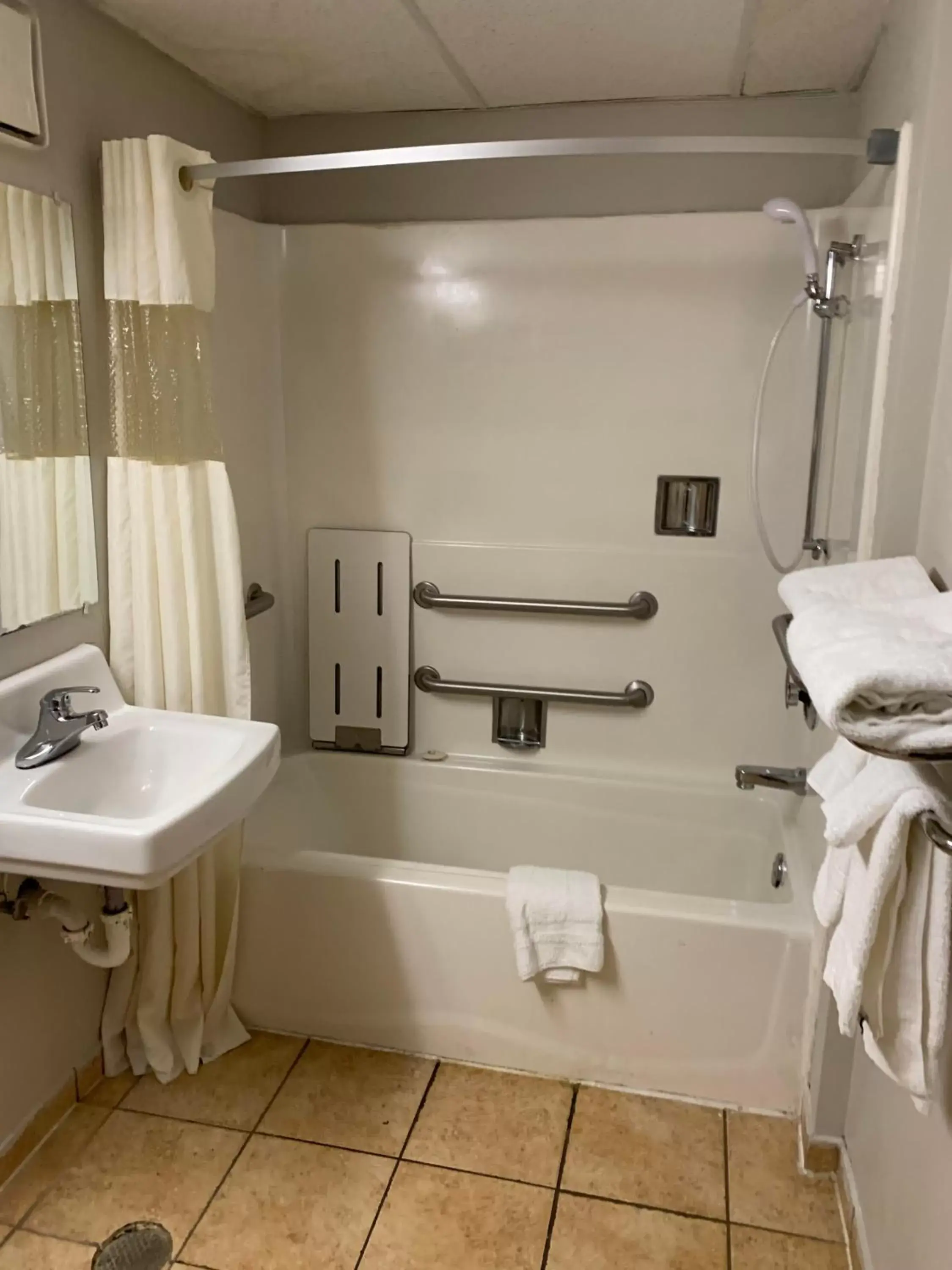 Shower, Bathroom in Days Inn by Wyndham Louisville Airport Fair and Expo Center