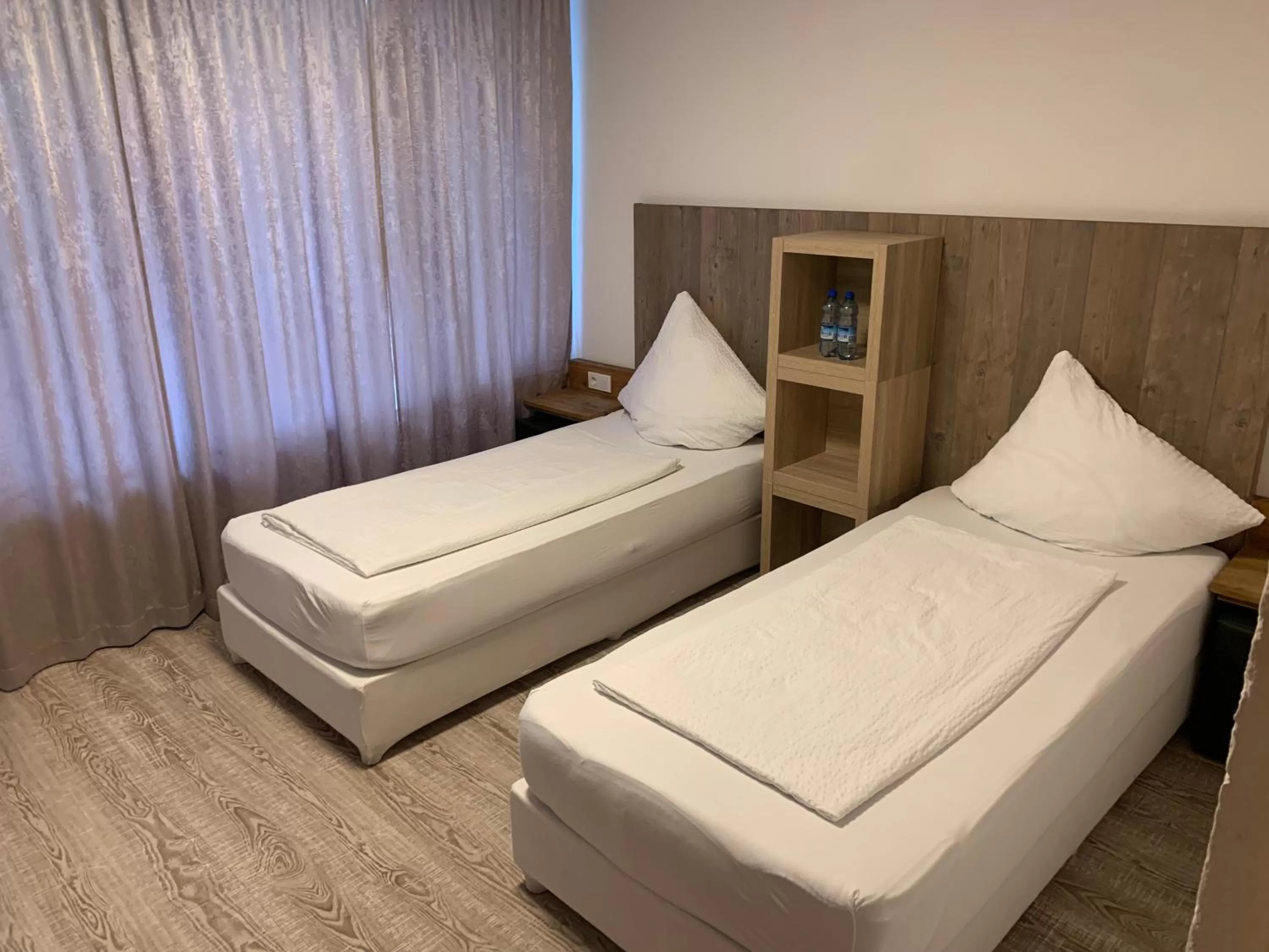 Bed in Smart Stay Rooms Feldkirch