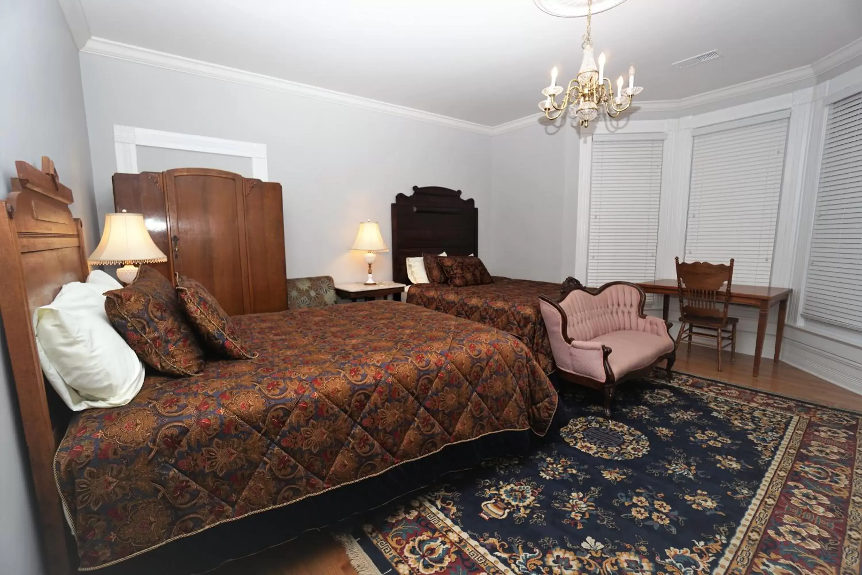 Photo of the whole room, Bed in 1895 Washington Hotel