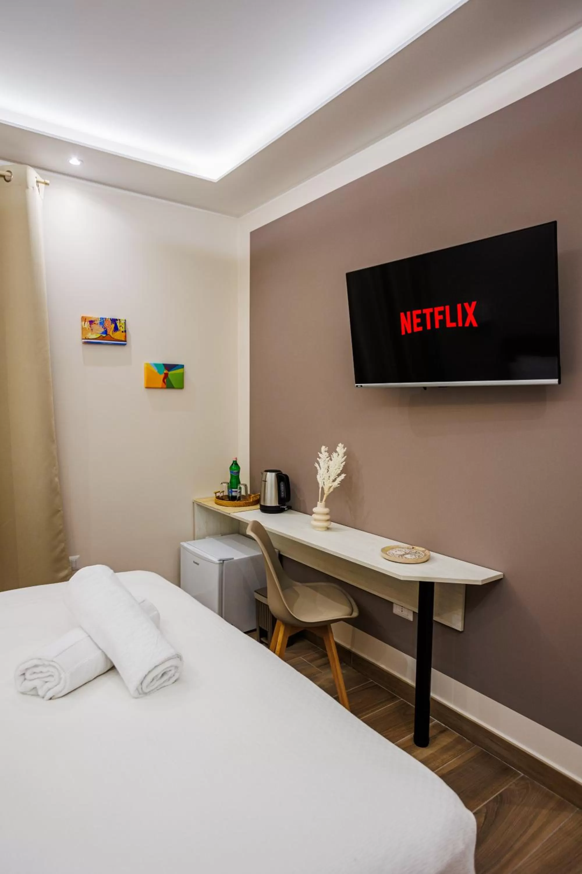 Bed, TV/Entertainment Center in Peca's room