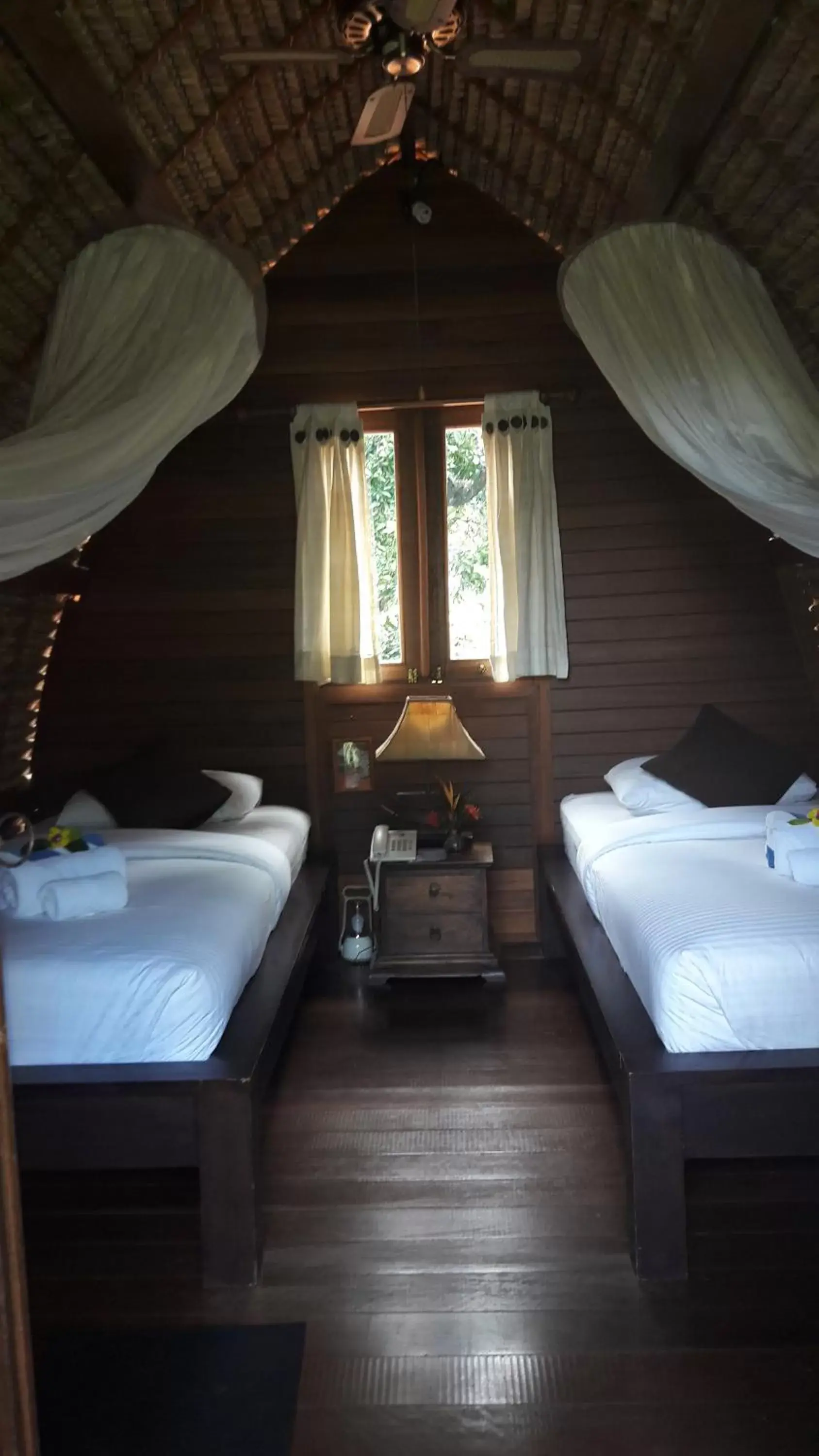 Bed in Puri Mangga Sea View Resort and Spa