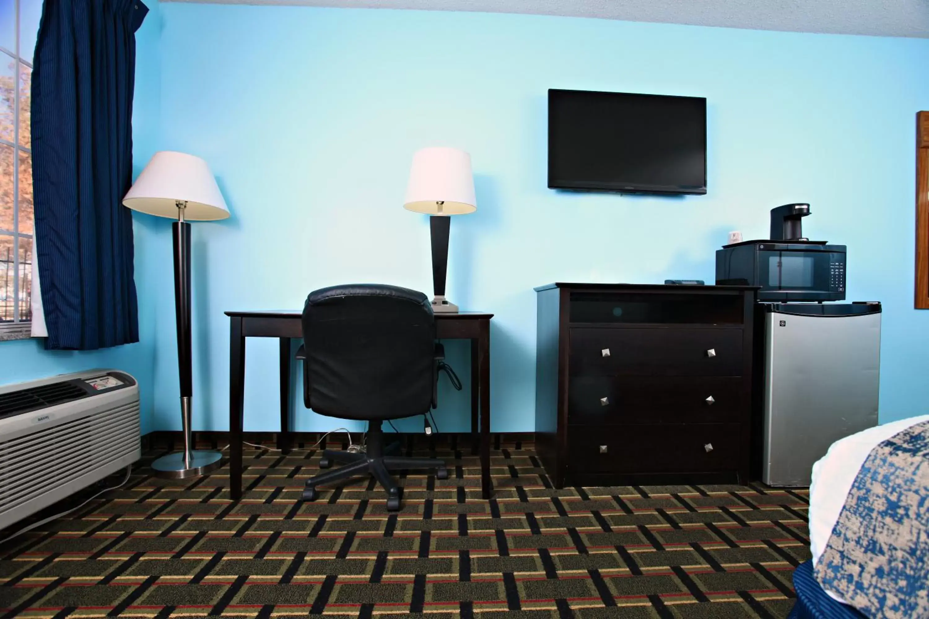 TV and multimedia, TV/Entertainment Center in Coratel Inn & Suites by Jasper Newton