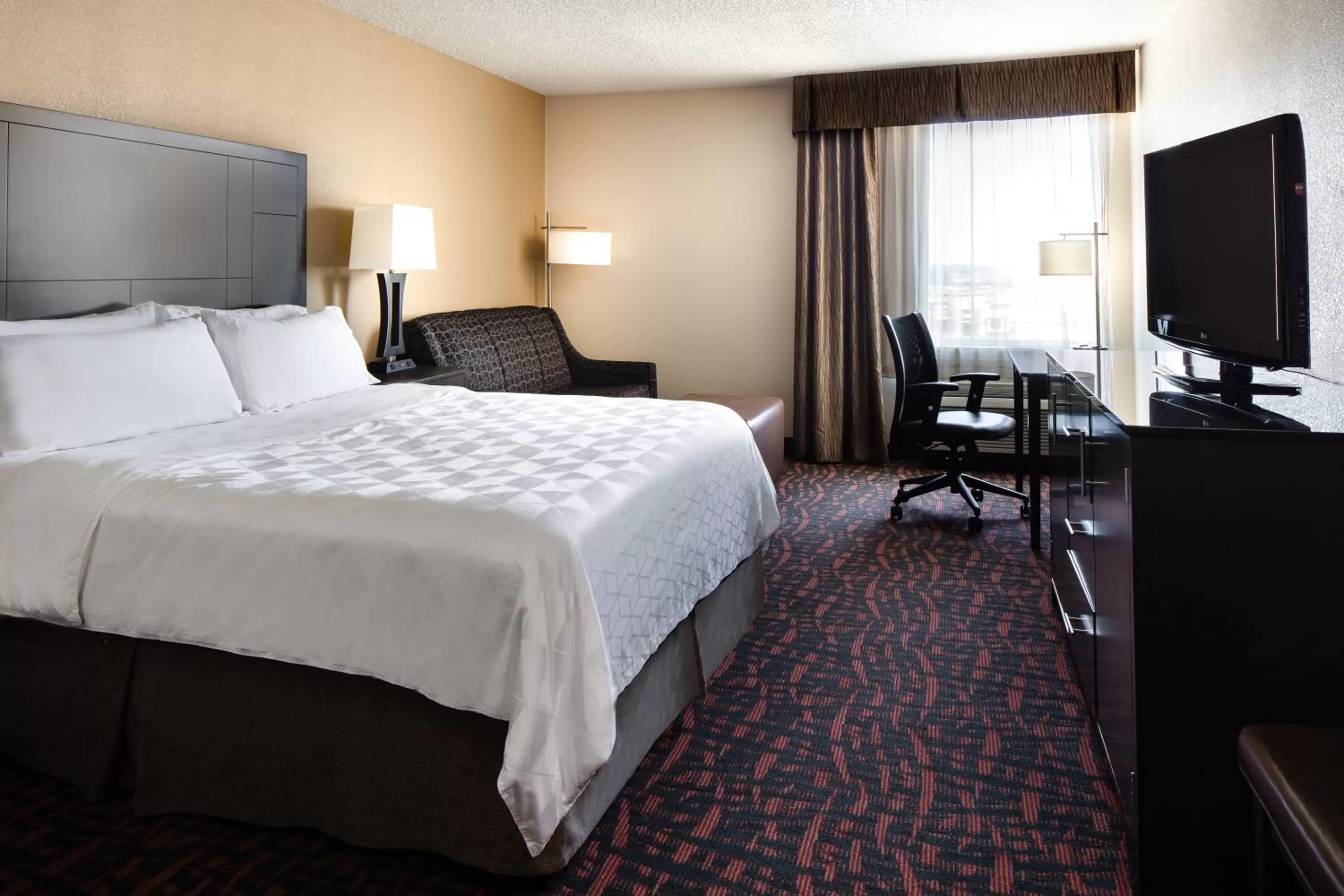 Photo of the whole room, Bed in Holiday Inn Wichita East I-35 by IHG