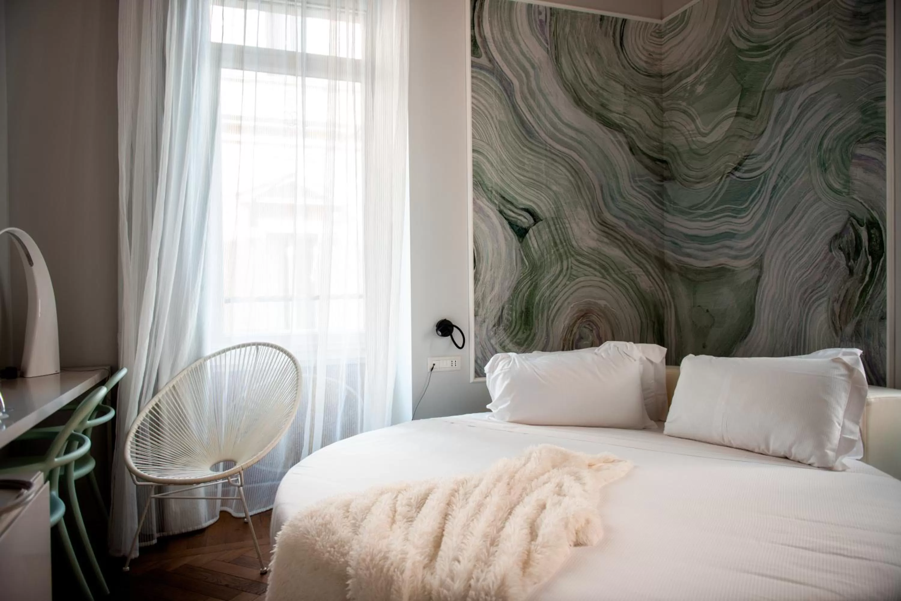 Decorative detail, Bed in Boutique Centrale Palace Hotel