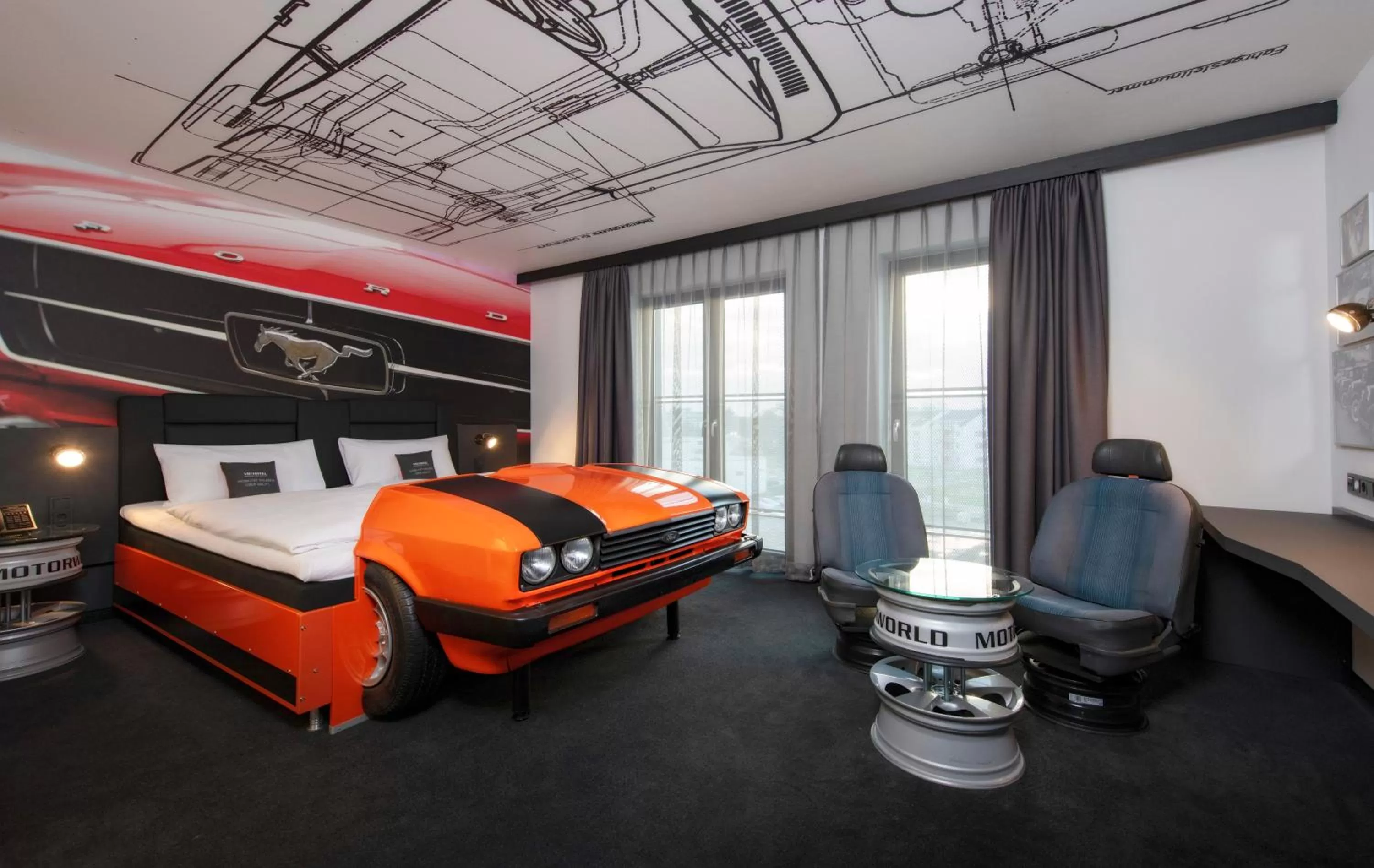 Photo of the whole room, Bed in V8 Hotel Köln at MOTORWORLD