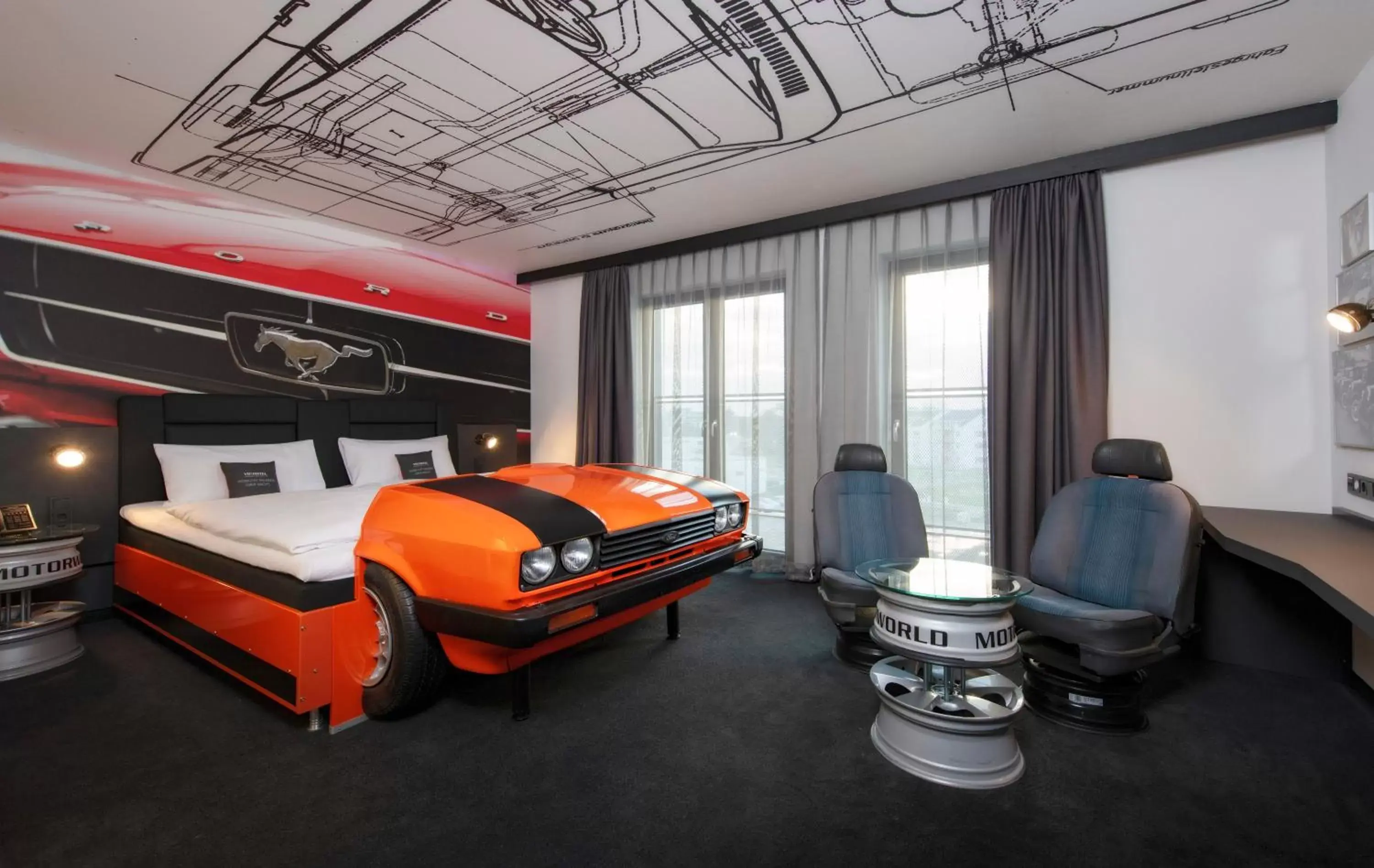 Photo of the whole room, Bed in V8 Hotel Köln at MOTORWORLD Photo of the whole room, Bed in V8 Hotel Köln at MOTORWORLD