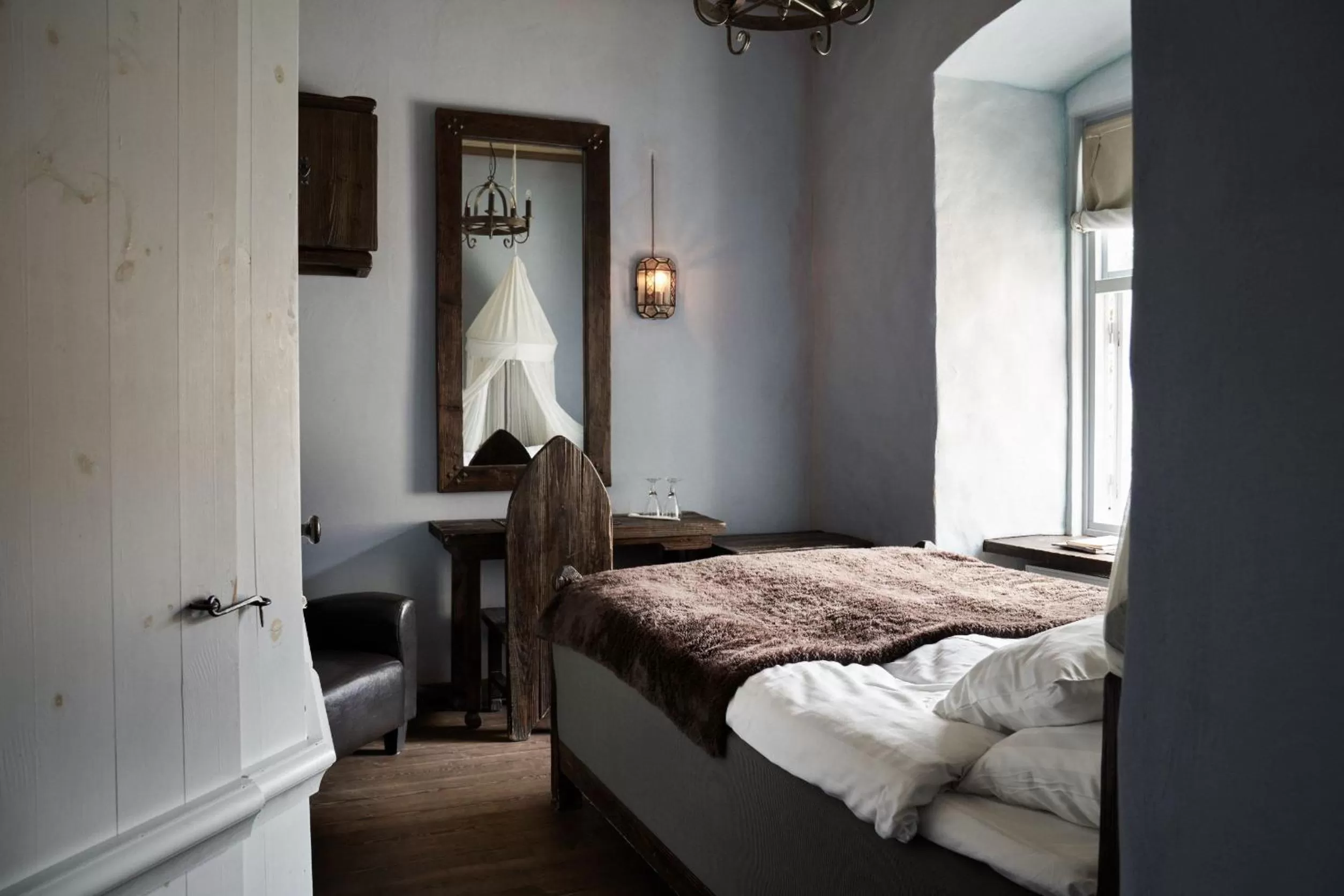 Photo of the whole room, Bed in Hotel Helgeand Wisby