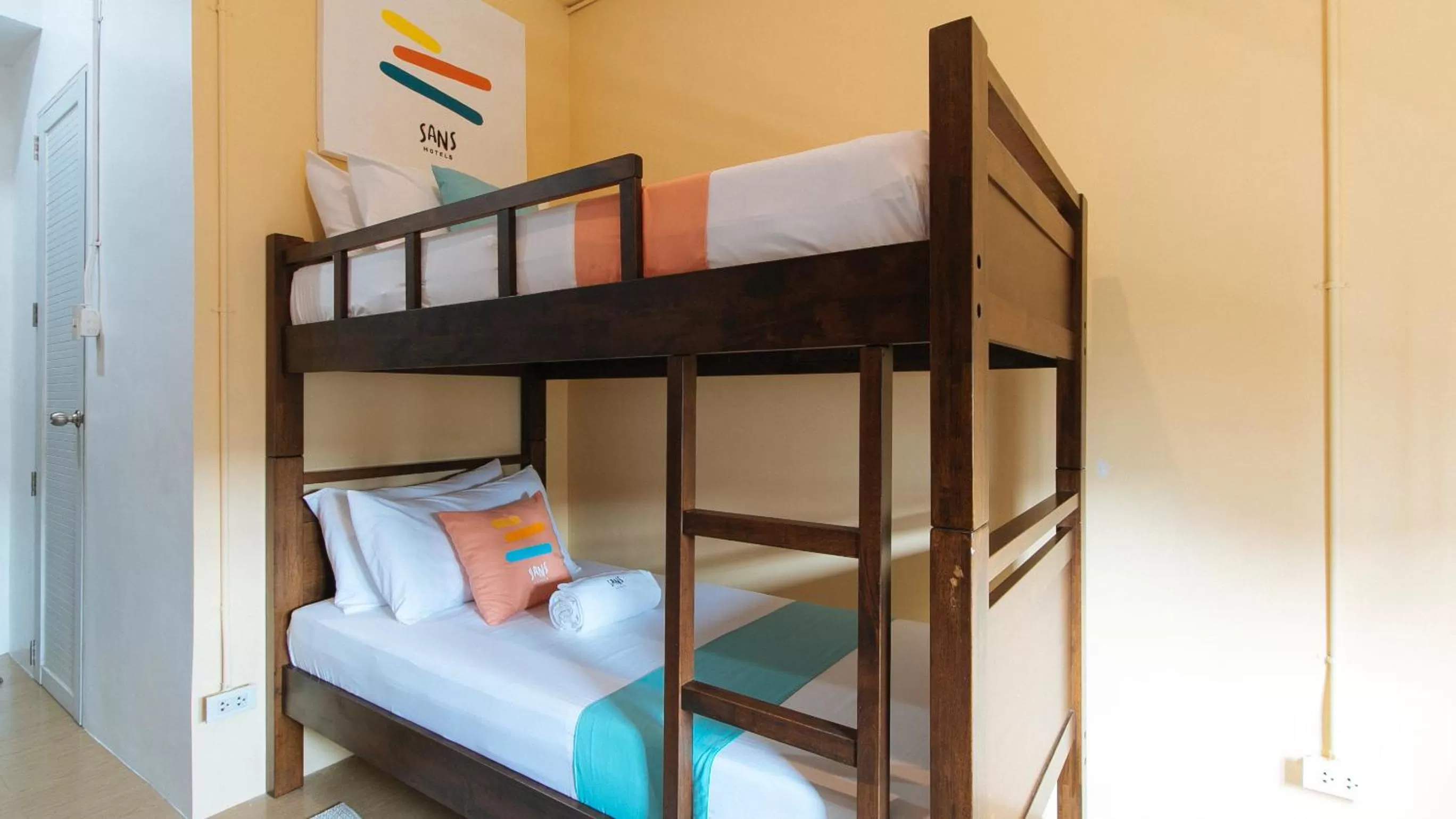 Bed in Sans Hotel Laperal Manila