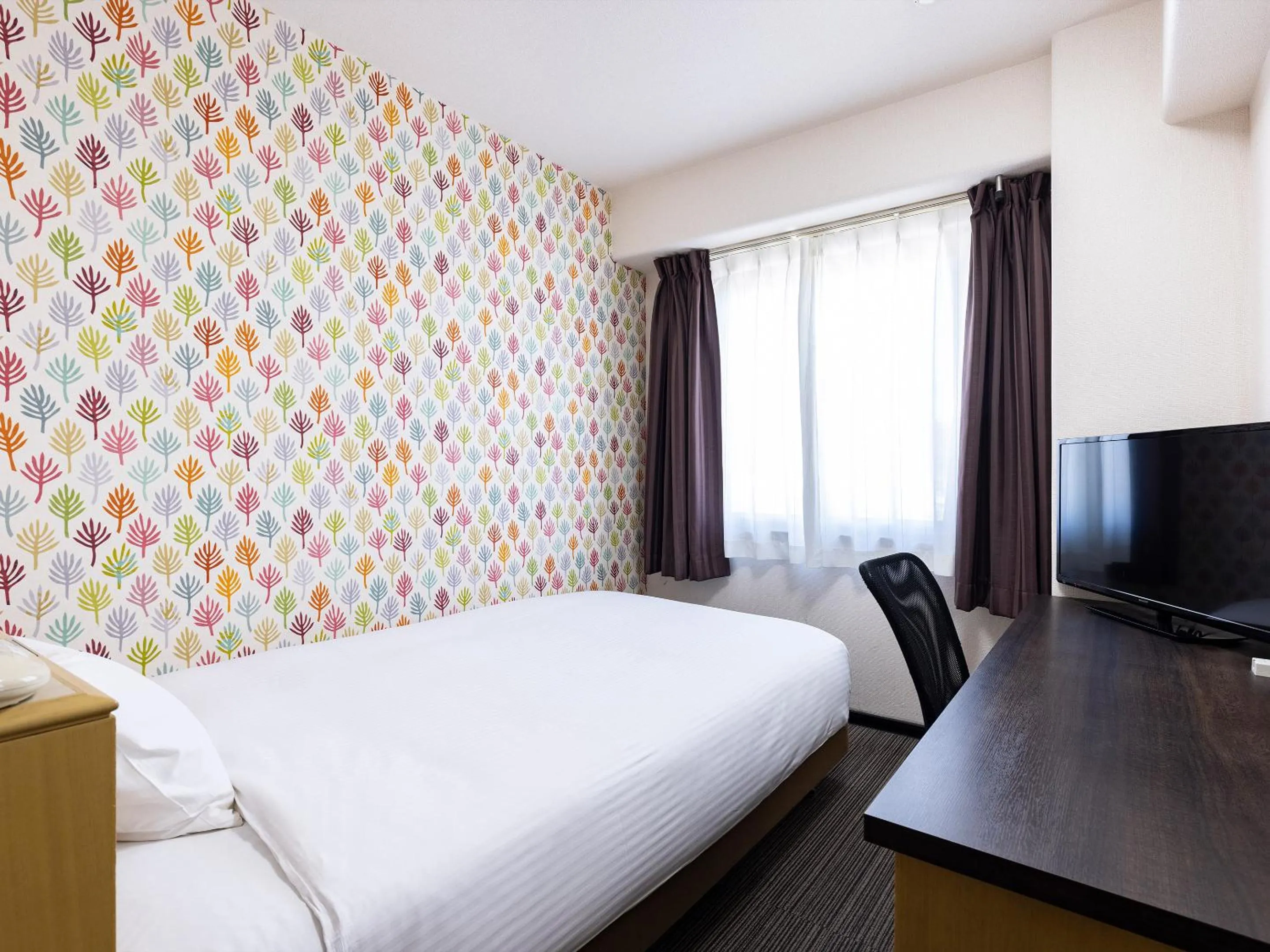 Bed in KOKO STAY Kumamoto Yatsushiro - formerly Hotel Wing International Kumamoto Yatsushiro