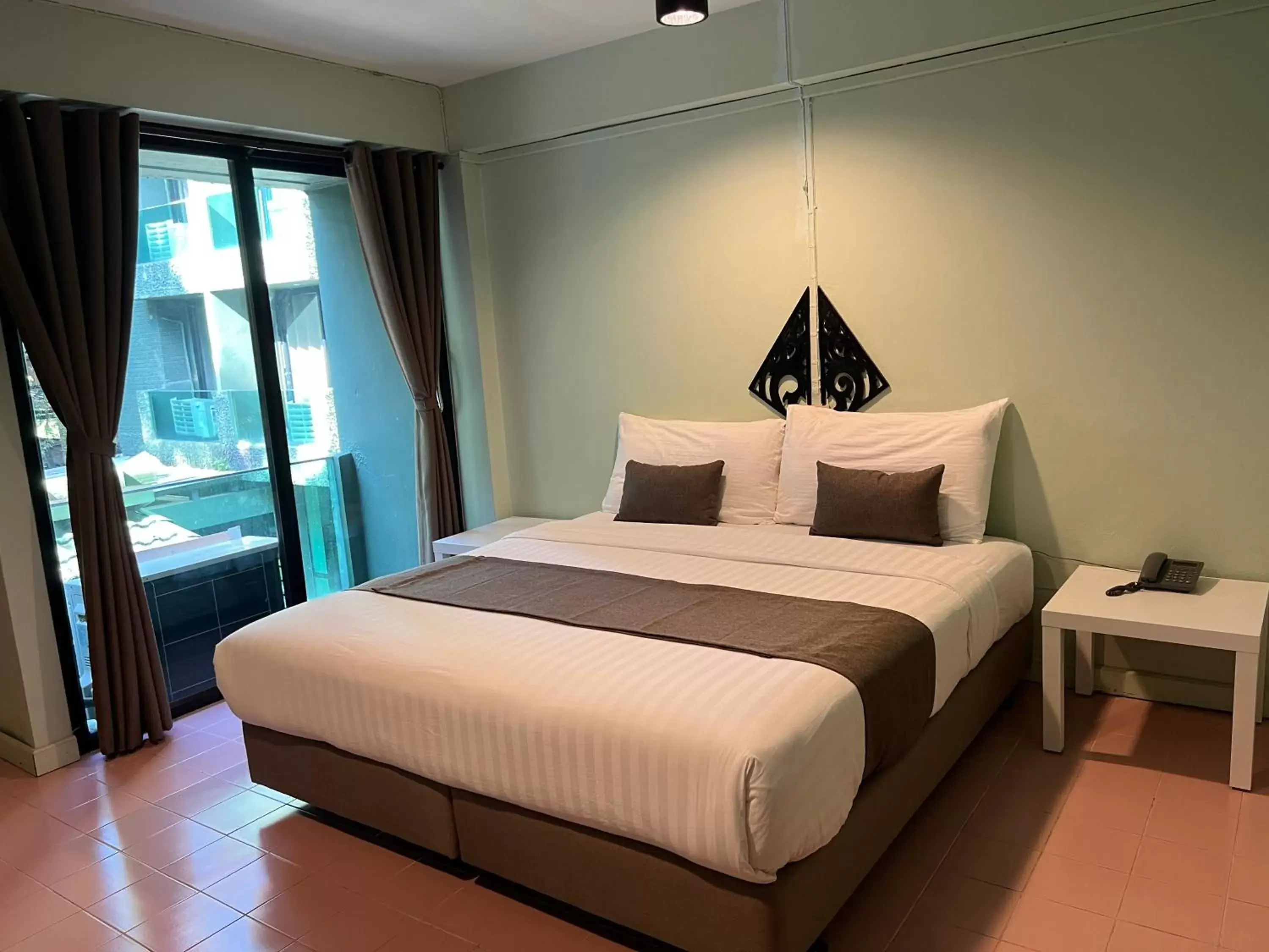 Property building, Bed in A Hotel Budget