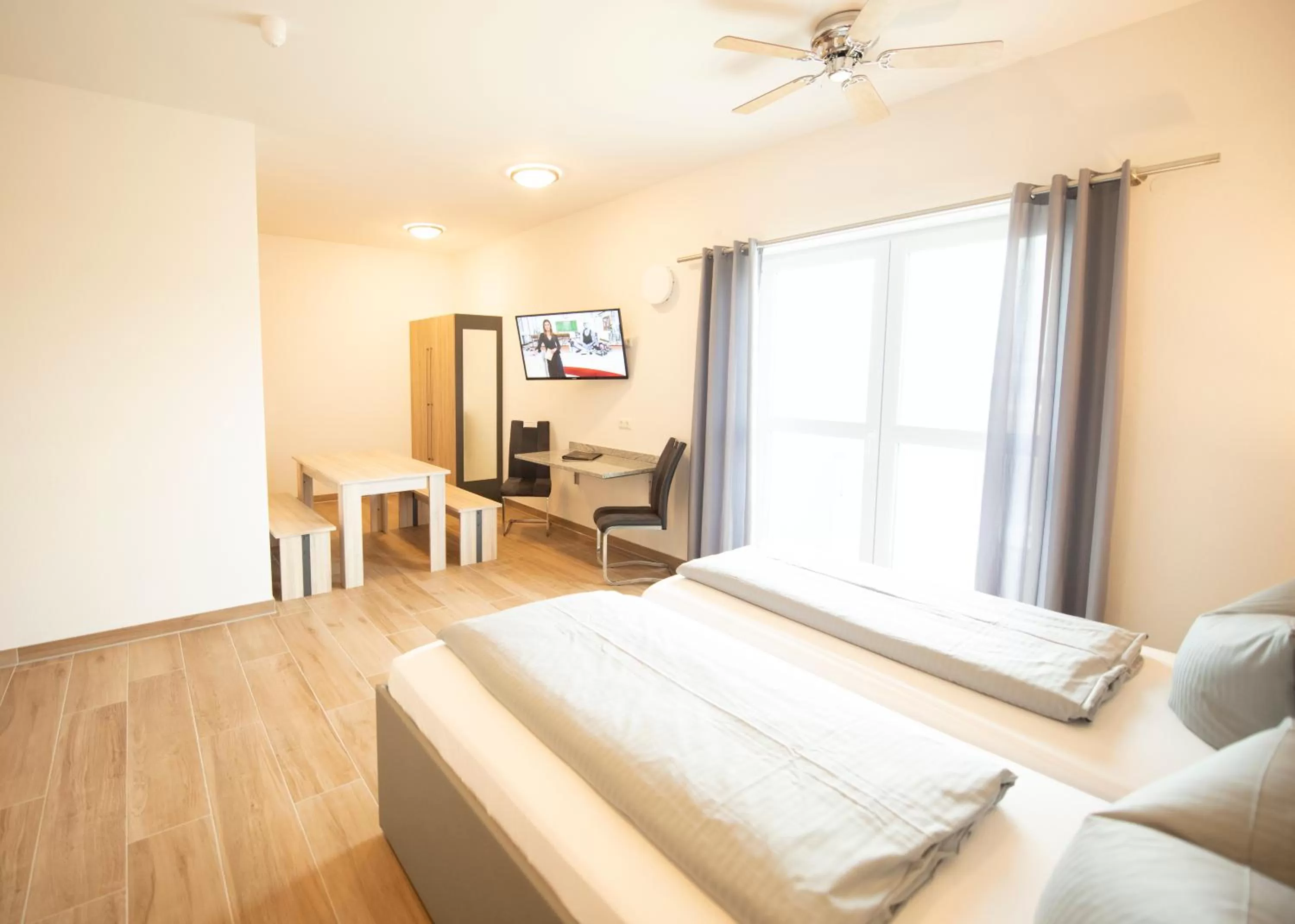 Photo of the whole room, Bed in Stadthotel Donauwörth