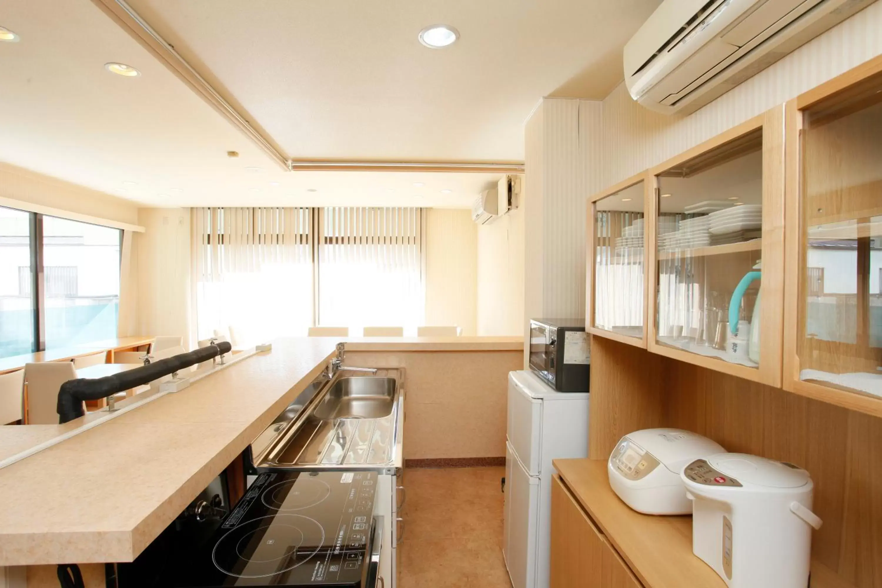 Kitchen/Kitchenette in Guest House Sonomama