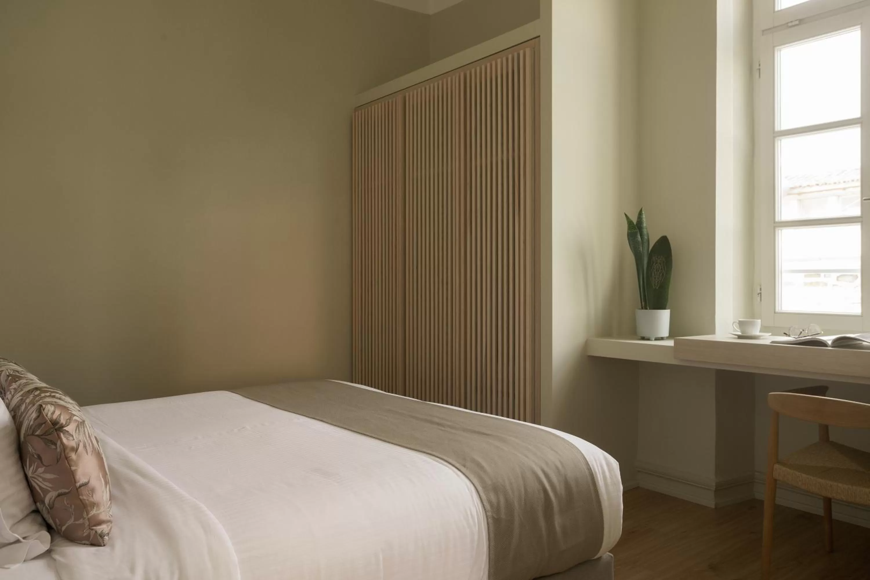 Bed in SYROS SOUL LUXURY SUITES