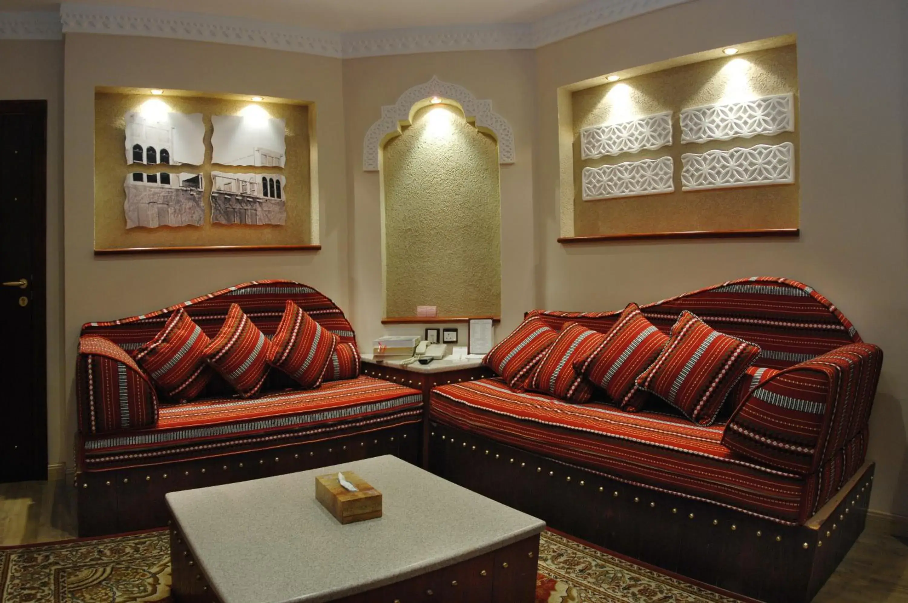 Seating area in Al Liwan Suites